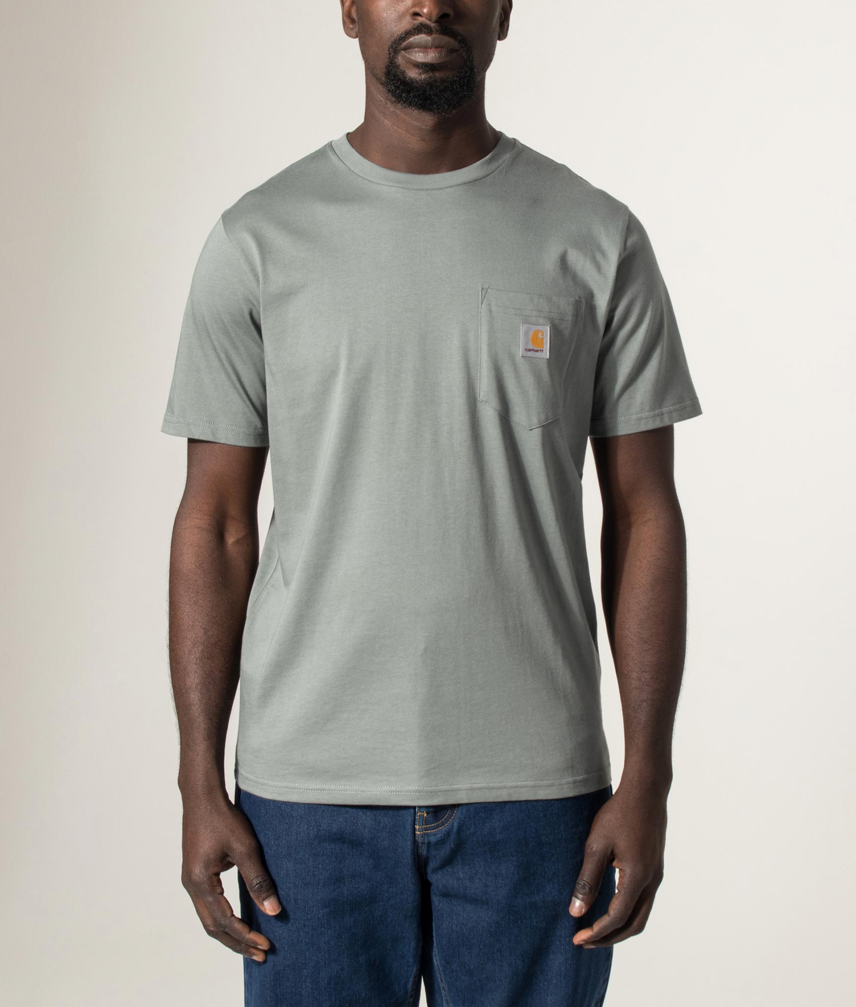 Carhartt WIP Pocket T-Shirt in Velvet Green at EQVVS Menswear. Model front shot.