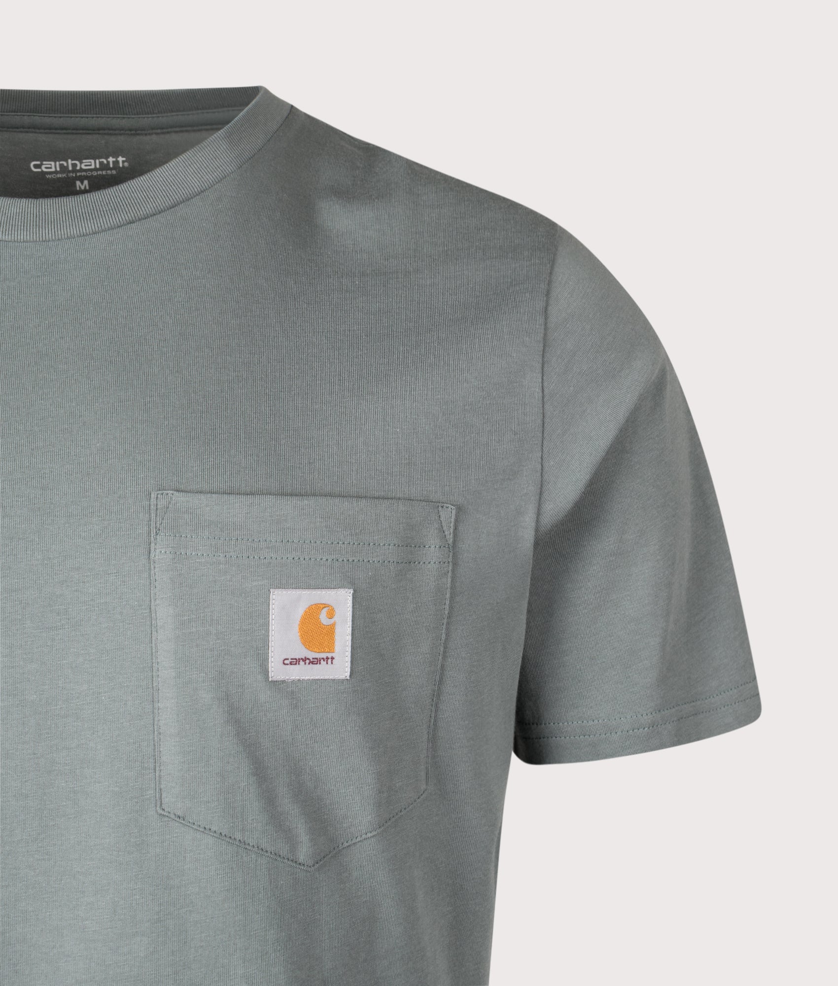 Carhartt WIP Pocket T-Shirt in Velvet Green at EQVVS Menswear. Detail shot.