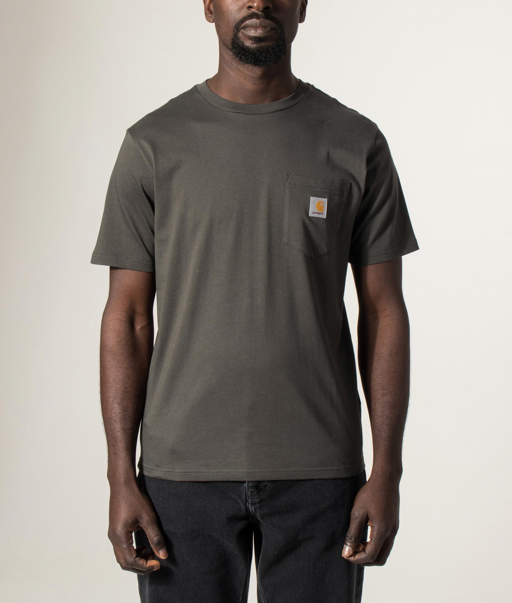 Carhartt WIP Pocket T-Shirt in Oxide Green at EQVVS Menswear. Front shot.