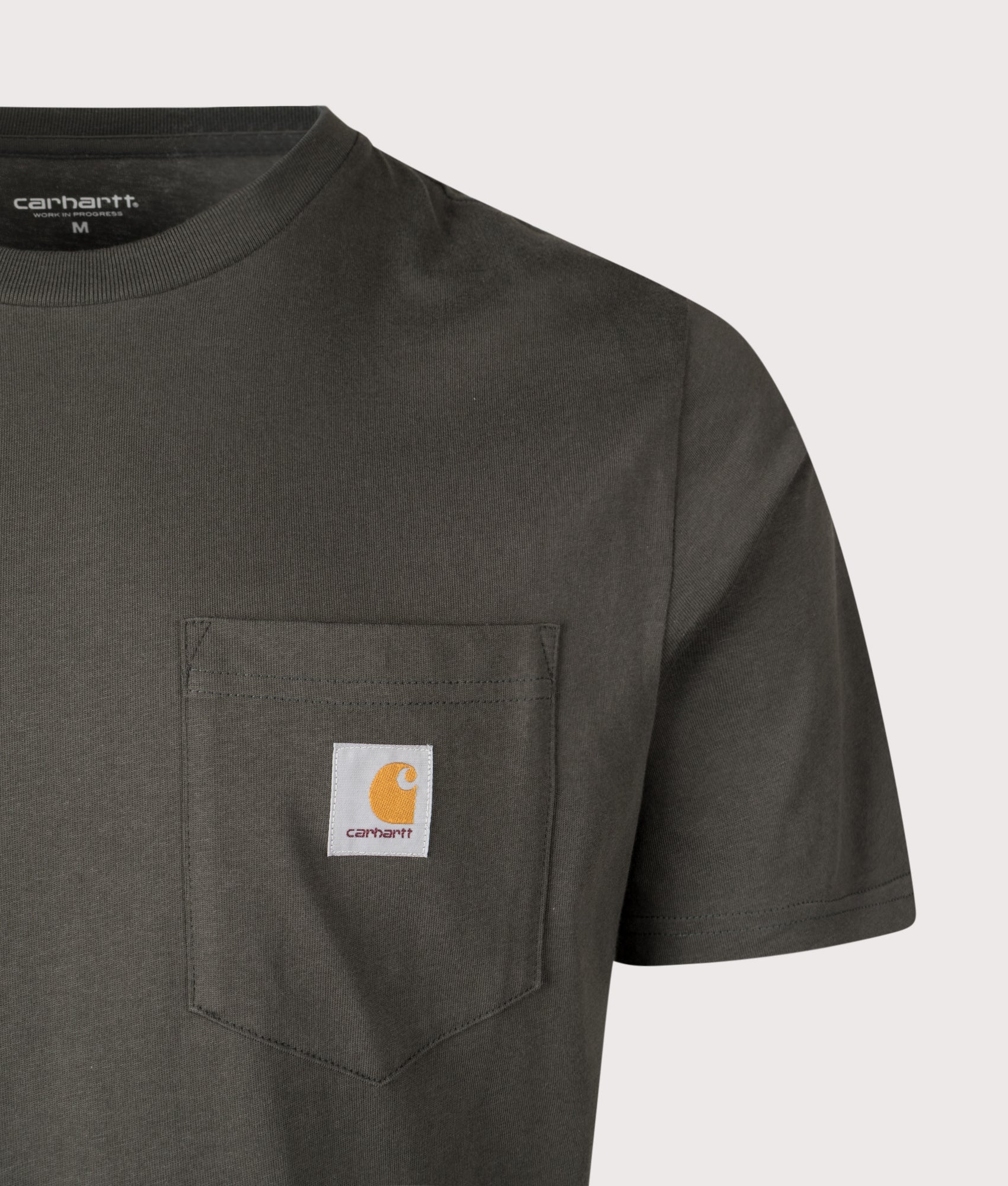 Carhartt WIP Pocket T-Shirt in Oxide Green at EQVVS Menswear. Detail shot.