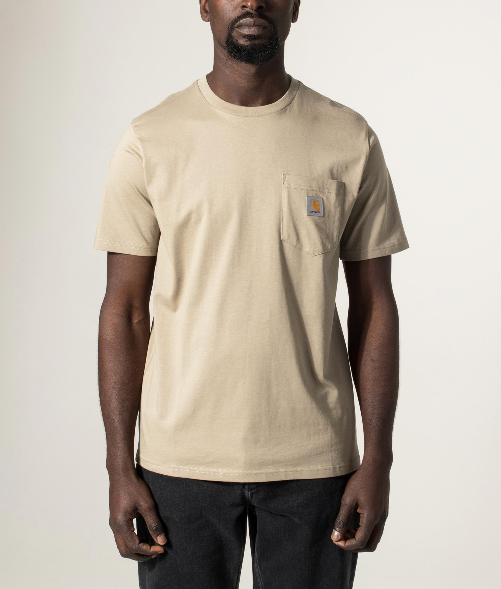 Carhartt WIP Pocket T-Shirt in Iroko at EQVVS Menswear. Model front shot.