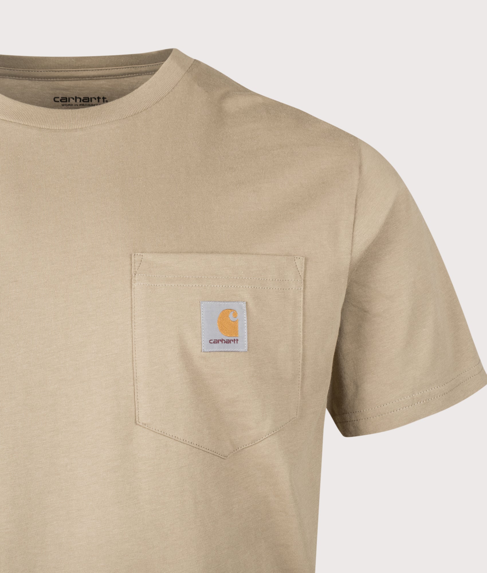 Carhartt WIP Pocket T-Shirt in Iroko at EQVVS Menswear. Detail shot.