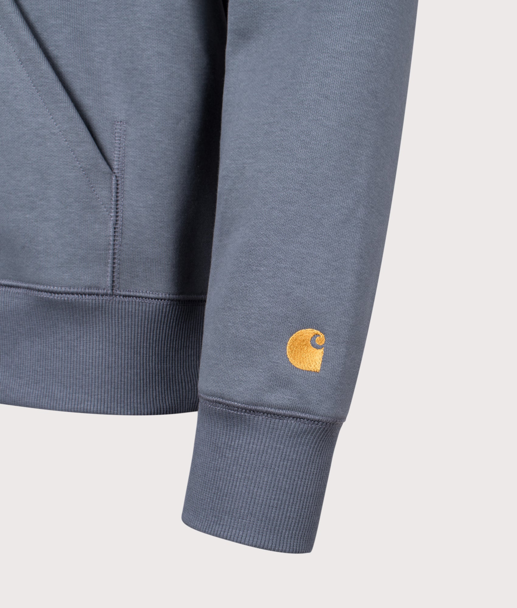 Carhartt WIP Chase Hoodie in Cozy Blue and Gold at EQVVS Menswear. Detail shot.