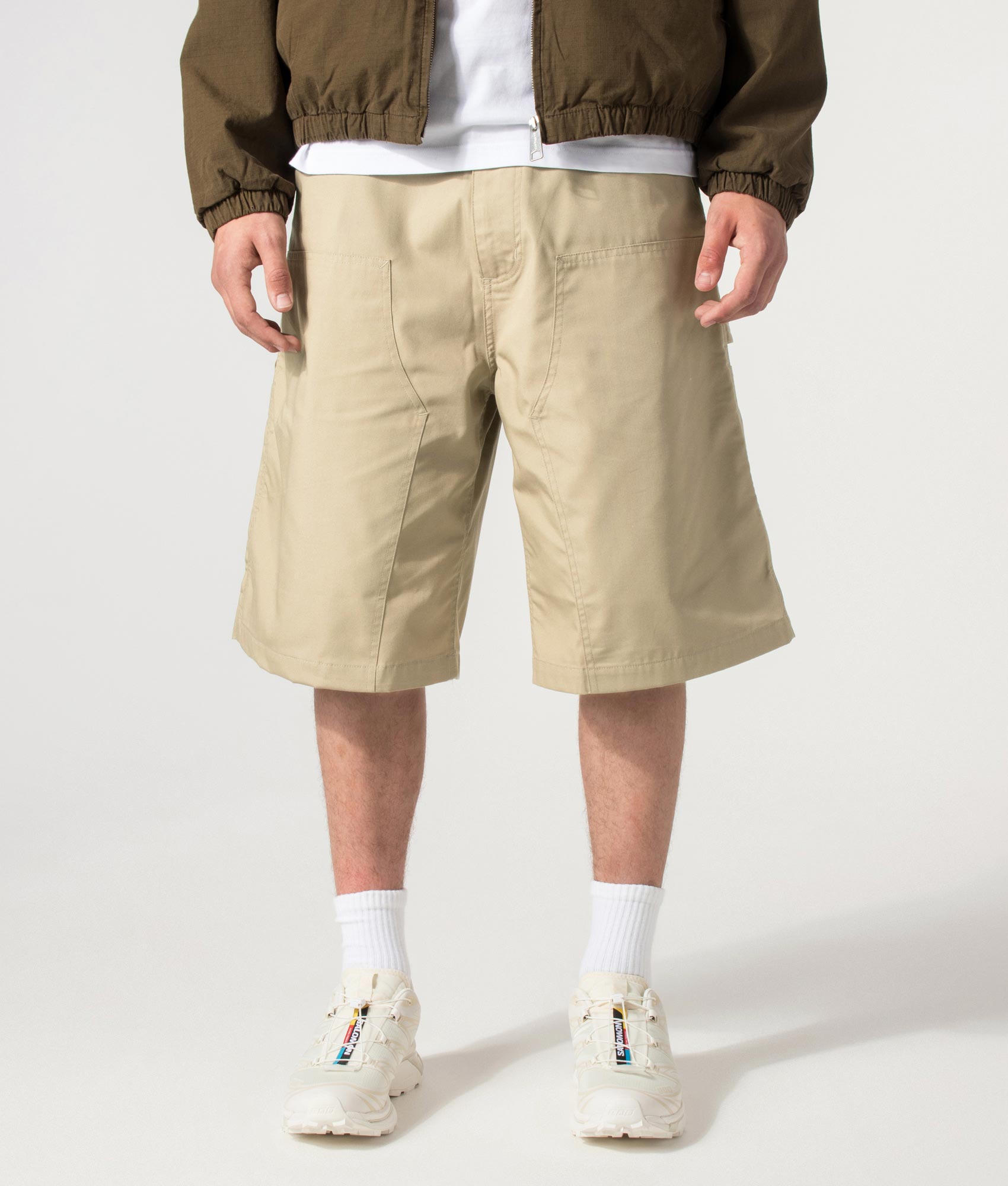 Carhartt WIP release the Postal Double Knee Shorts in Iroko at EQVVS Menswear. Model front shot.