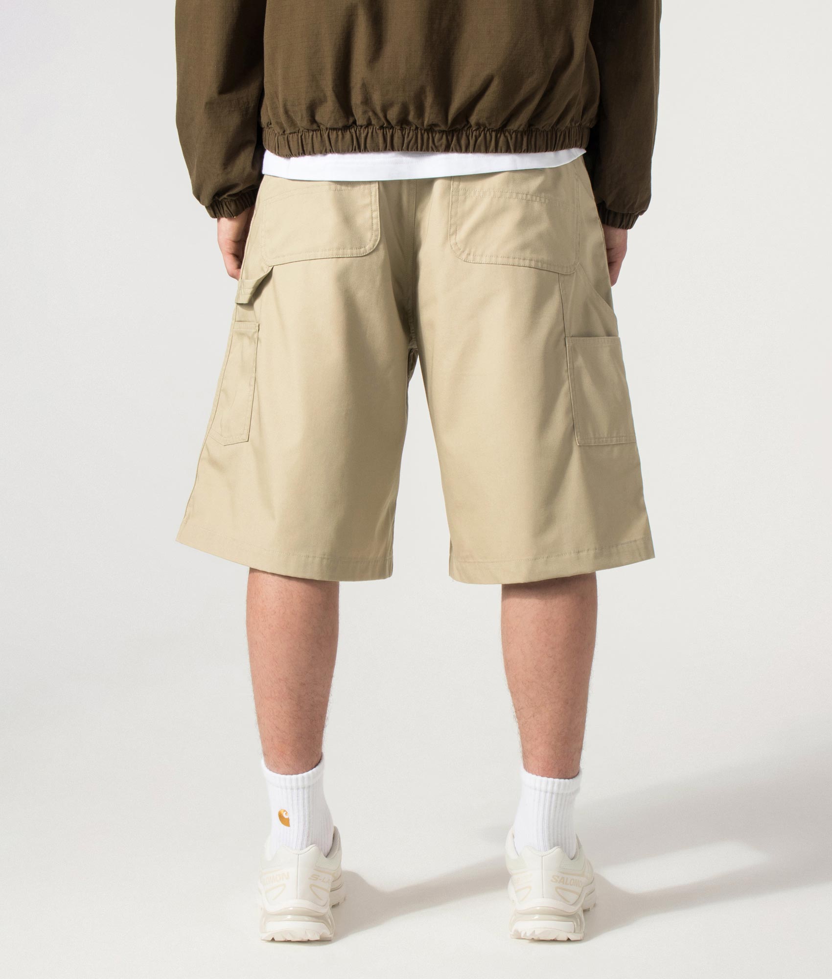 Carhartt WIP release the Postal Double Knee Shorts in Iroko at EQVVS Menswear. Model back shot.