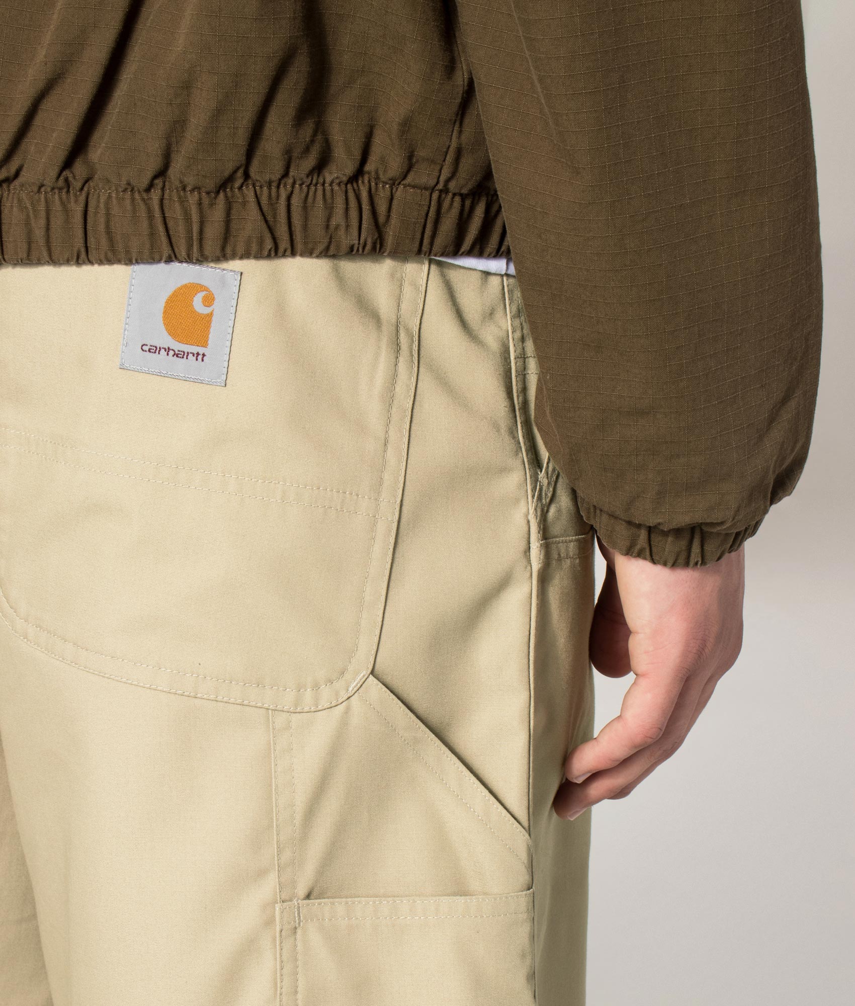Carhartt WIP release the Postal Double Knee Shorts in Iroko at EQVVS Menswear. Detail shot.