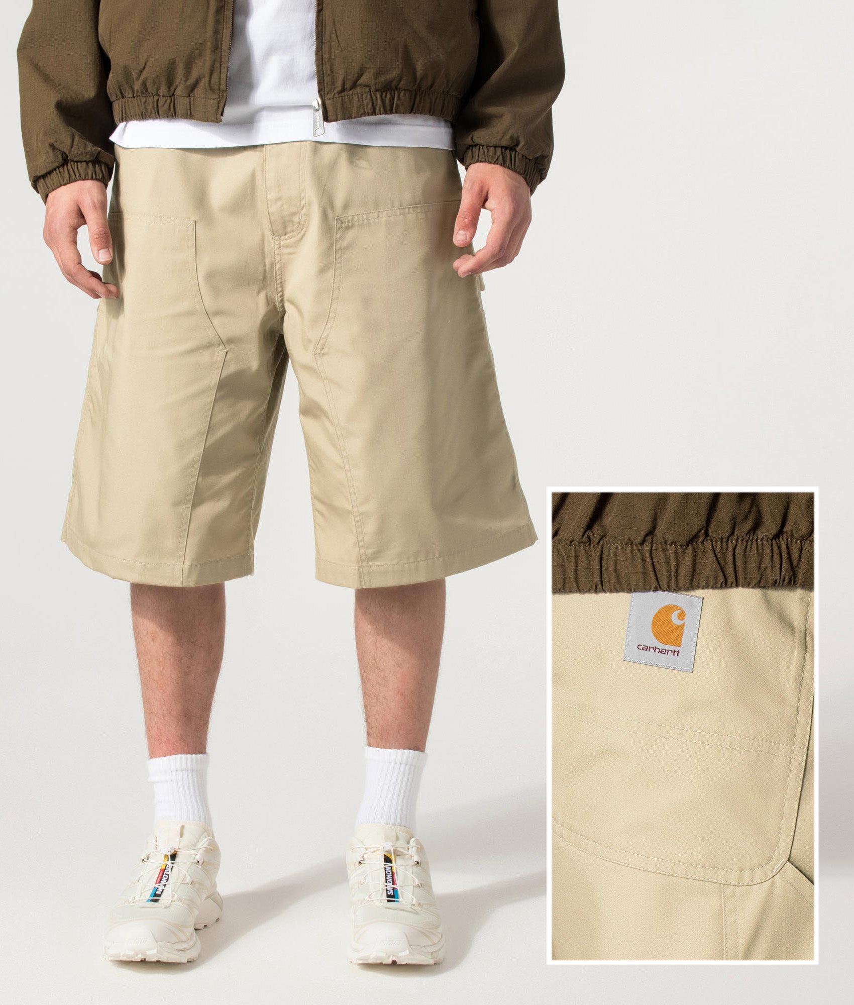 Carhartt WIP release the Postal Double Knee Shorts in Iroko at EQVVS Menswear. Front shot.
