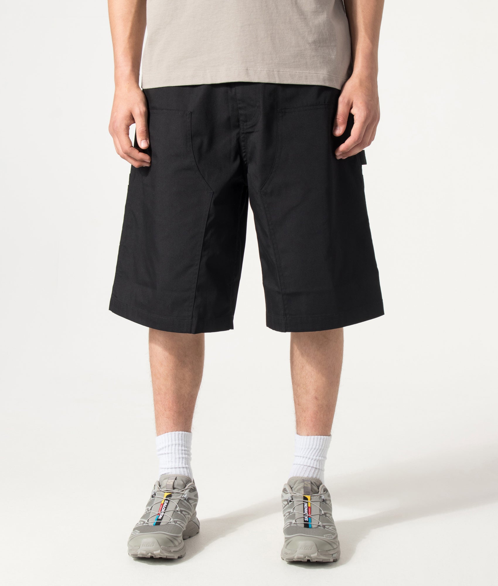 Carhartt WIP Postal Double Knee Shorts in Black at EQVVS Menswear. Front shot.