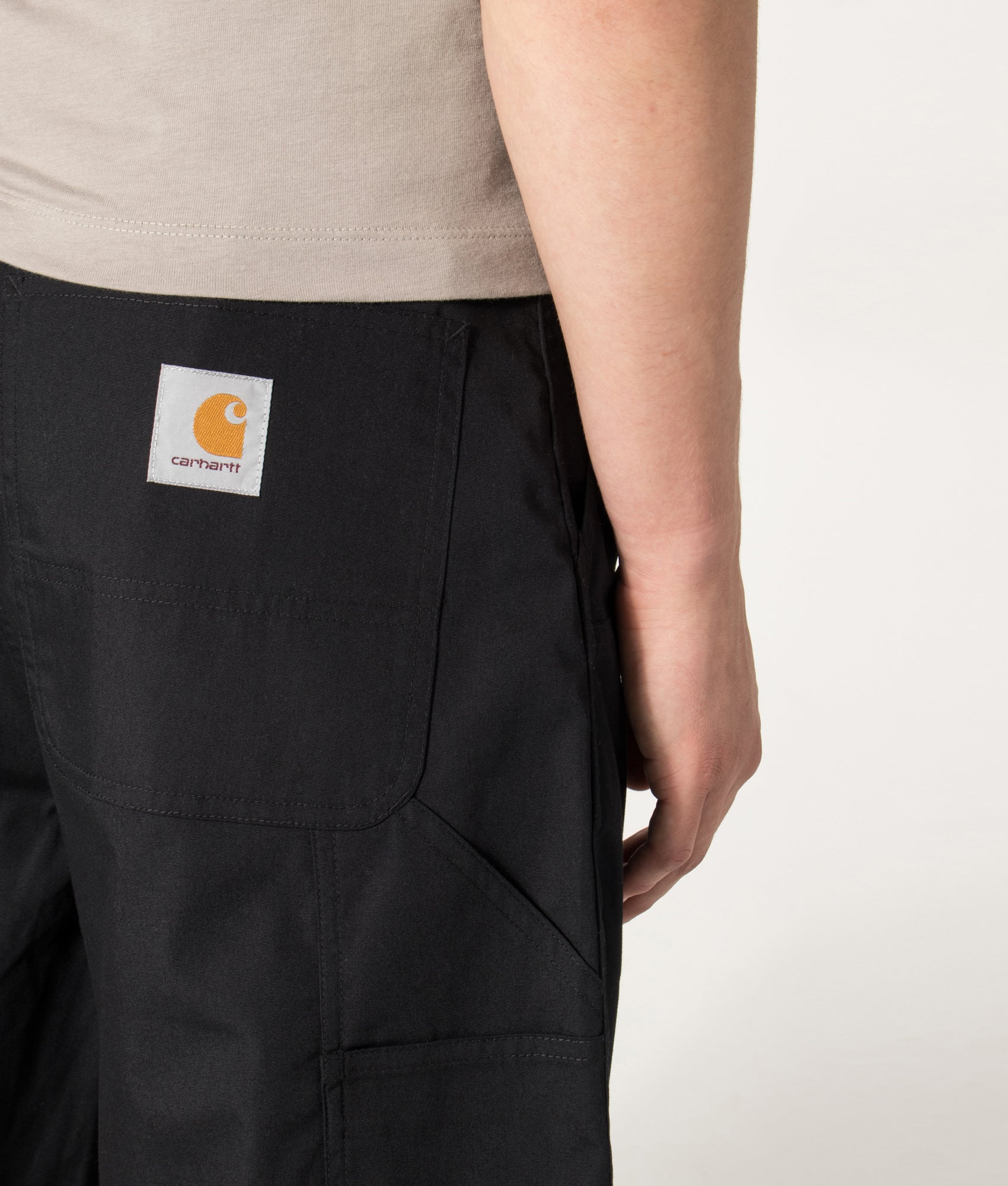 Carhartt WIP Postal Double Knee Shorts in Black at EQVVS Menswear. Detail shot.