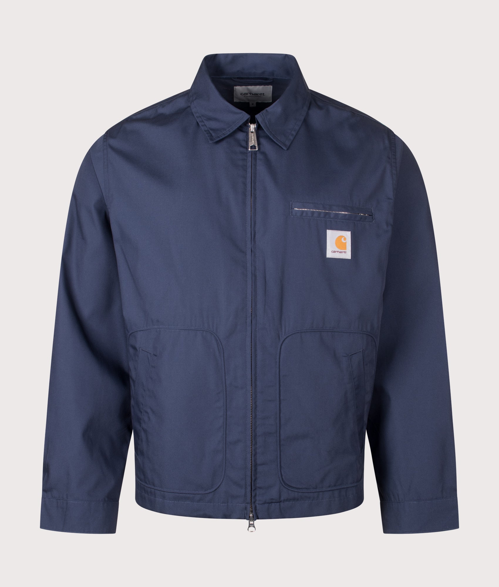 Carhartt WIP Postal Jacket in Blue at EQVVS Menswear. Front shot.