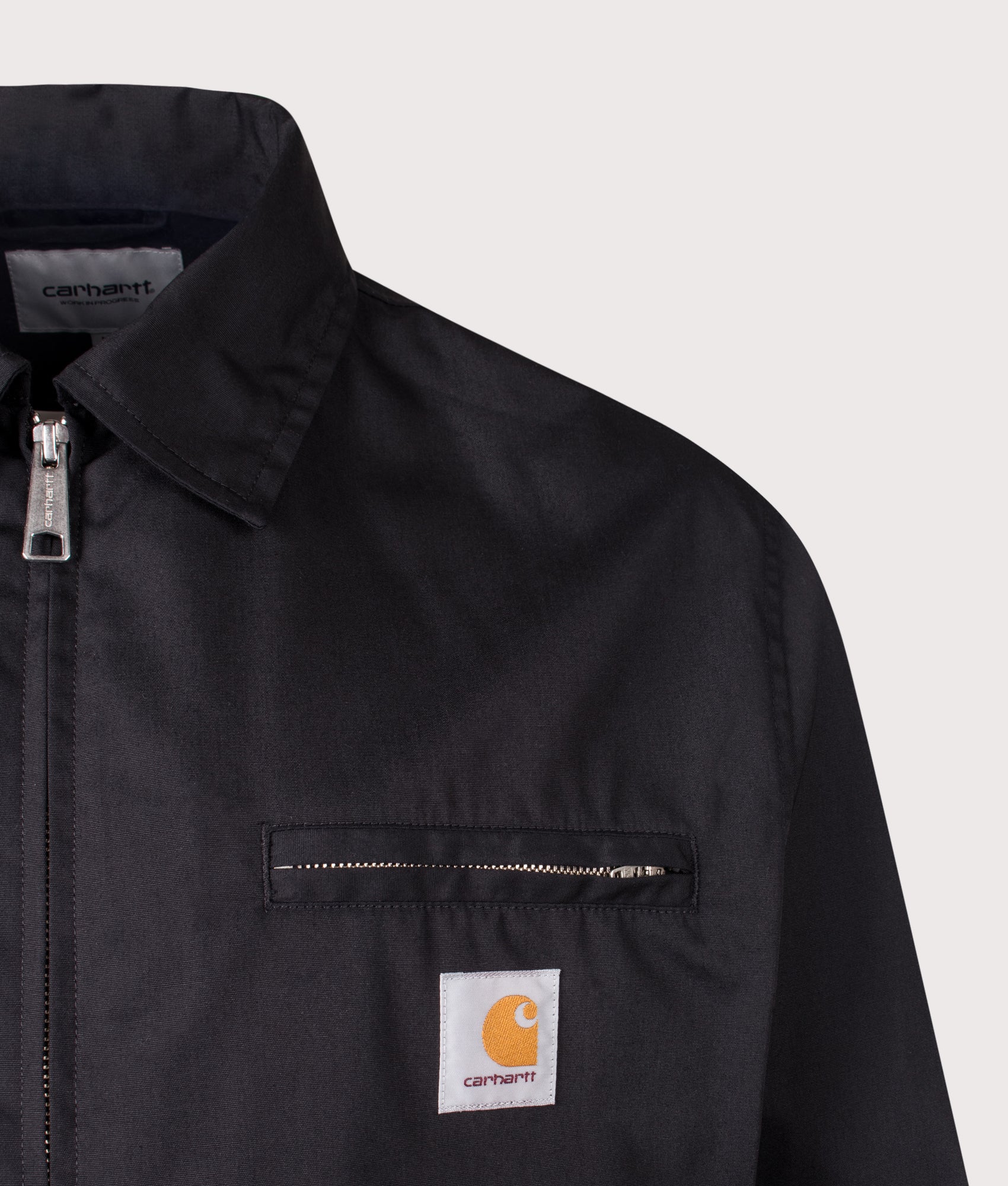 Postal Jacket in Black by Carhartt WIP. Shot by EQVVS. Detail shot.