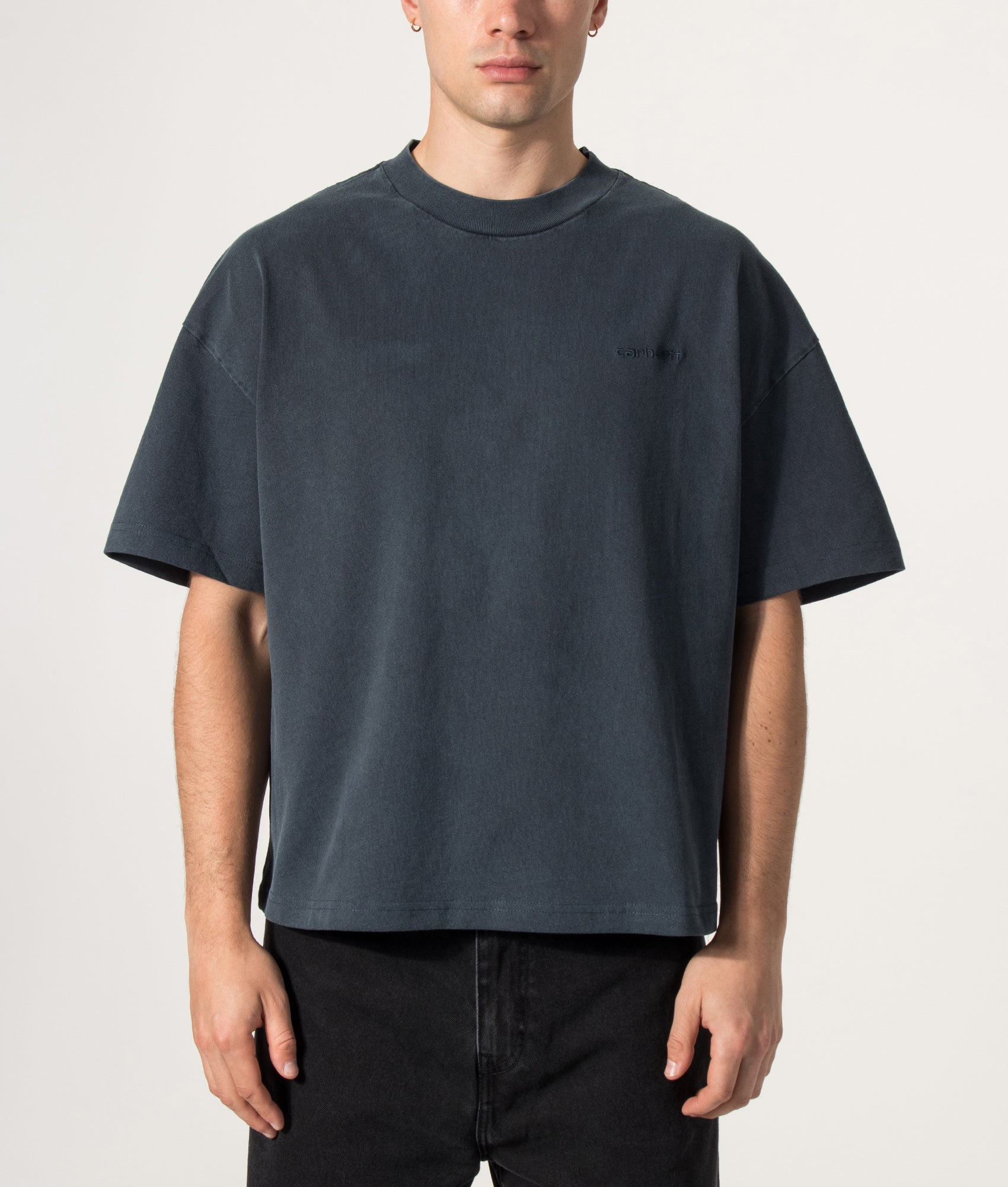 Carhartt WIP Boxy Loose Benton T-Shirt in Carbon at EQVVS Menswear. Model front shot.