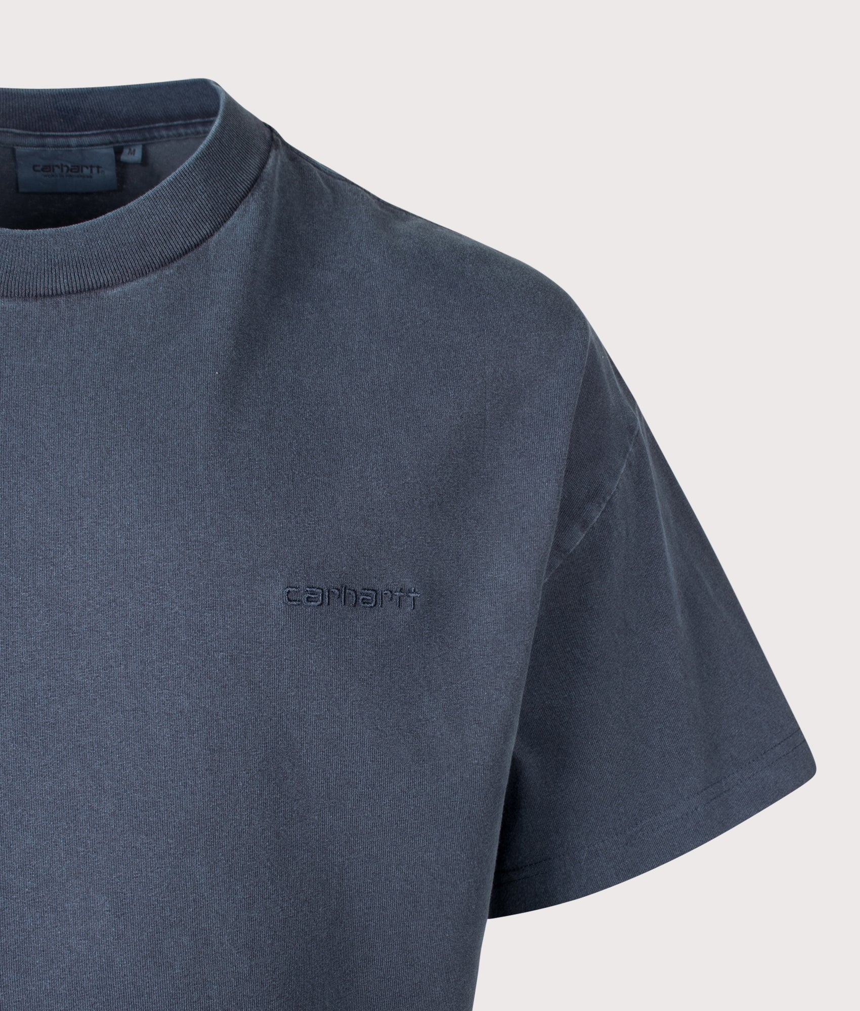 Boxy Loose Fit Benton T-Shirt in Carbon by Carhartt WIP. Shot by EQVVS. Detail shot.