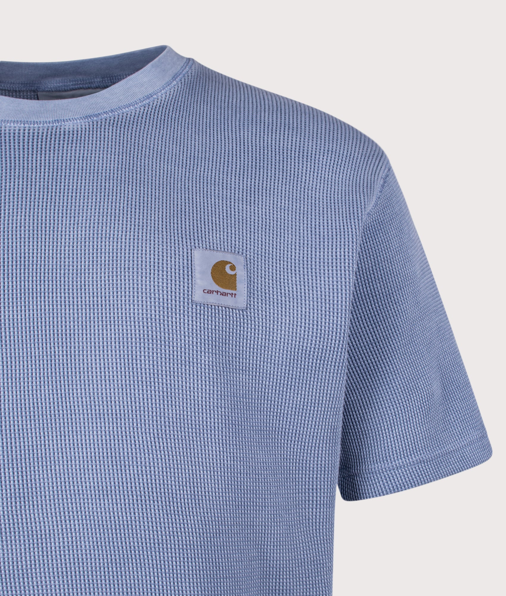 Carhartt WIP Relaxed Fit Nelson Waffle T-Shirt in Gentle Blue at EQVVS Menswear. Detail shot.