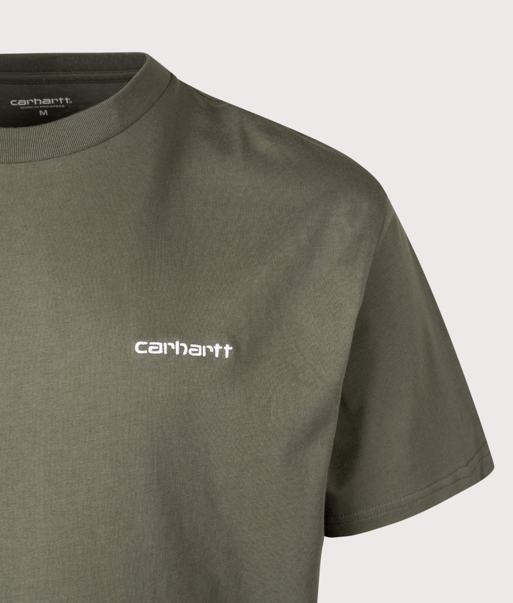Carhartt WIP Relaxed Fit Script Embroidery T-Shirt in Leaf and White at EQVVS Menswear. Detail shot.