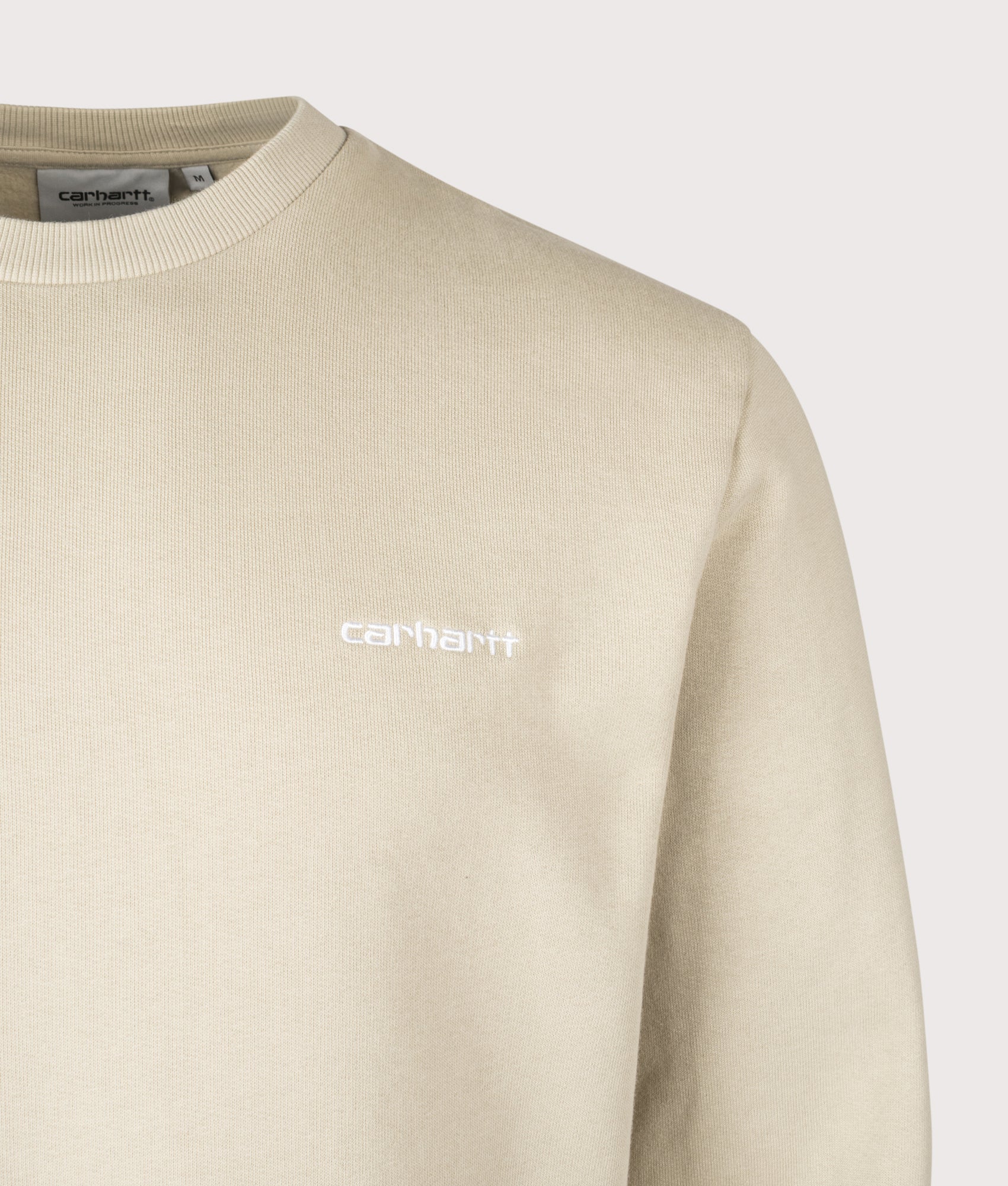 Carhartt WIP Script Embroidery Sweatshirt in Barchan and White at EQVVS Menswear. Detail shot.