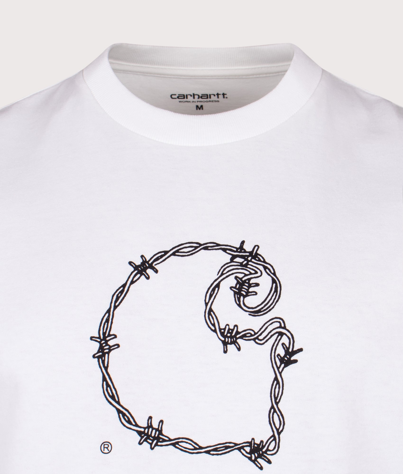 Carhartt WIP Loose Fit Barbwire C T-Shirt in White at EQVVS Menswear. Detail shot.