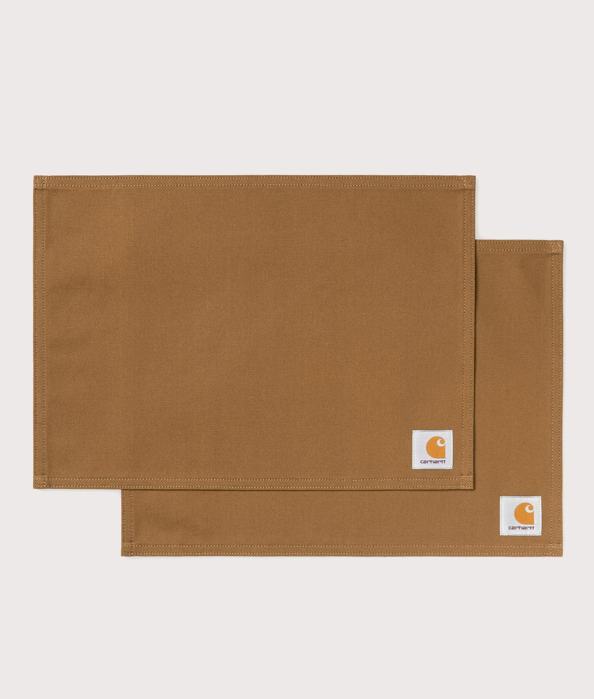 Carhartt WIP Canvas Table Set in Hamilton Brown at EQVVS Menswear. Front shot.