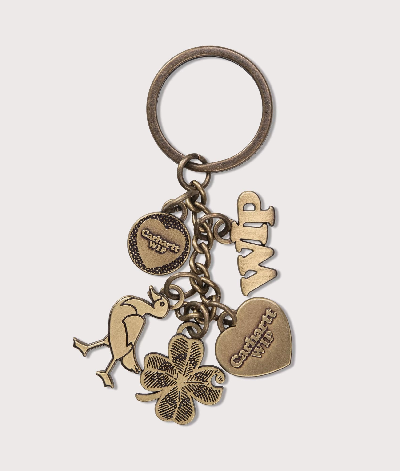  Carhartt WIP Charms Keychain in Gold at EQVVS Menswear. Front shot.