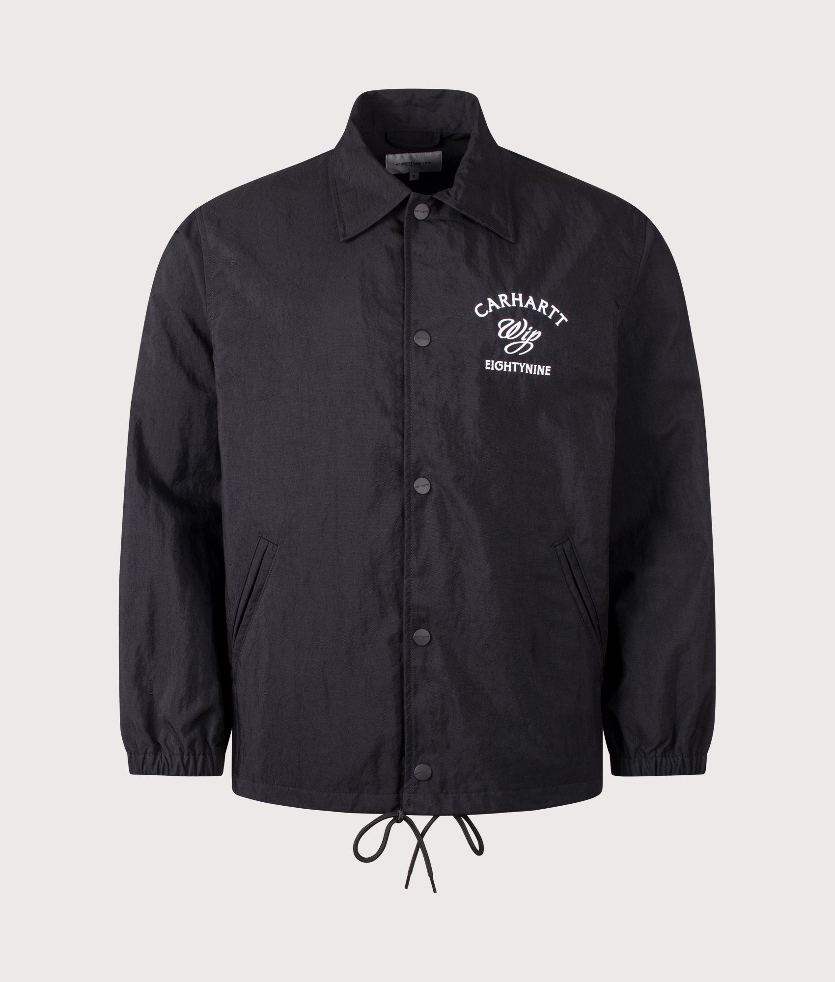 Eightynine Coach Jacket in Black/White by Carhartt WIP. Shot by EQVVS. Front shot.