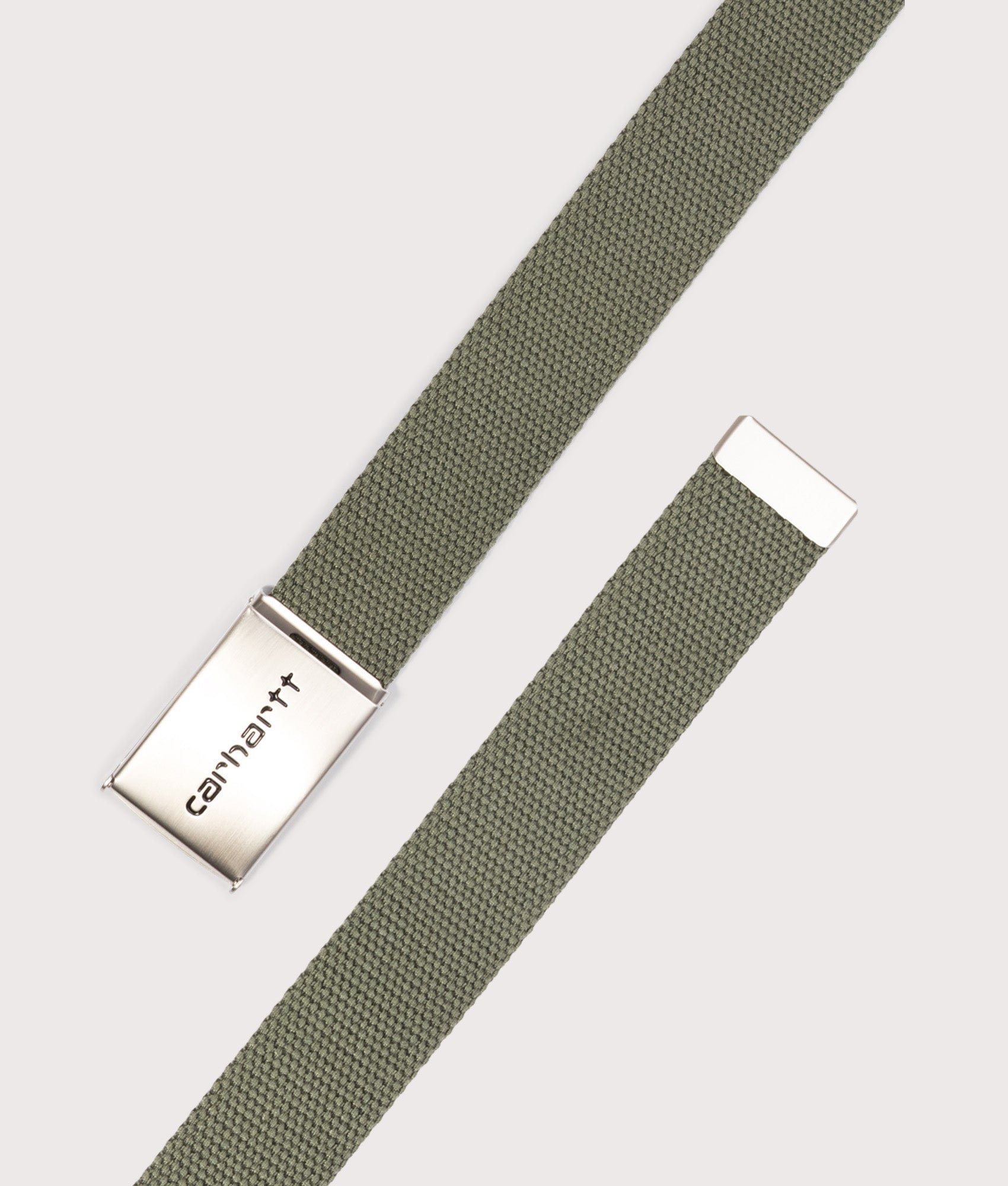 Carhartt WIP Chrome Logo Clip Belt in Leaf at EQVVS Menswear. Front shot. 