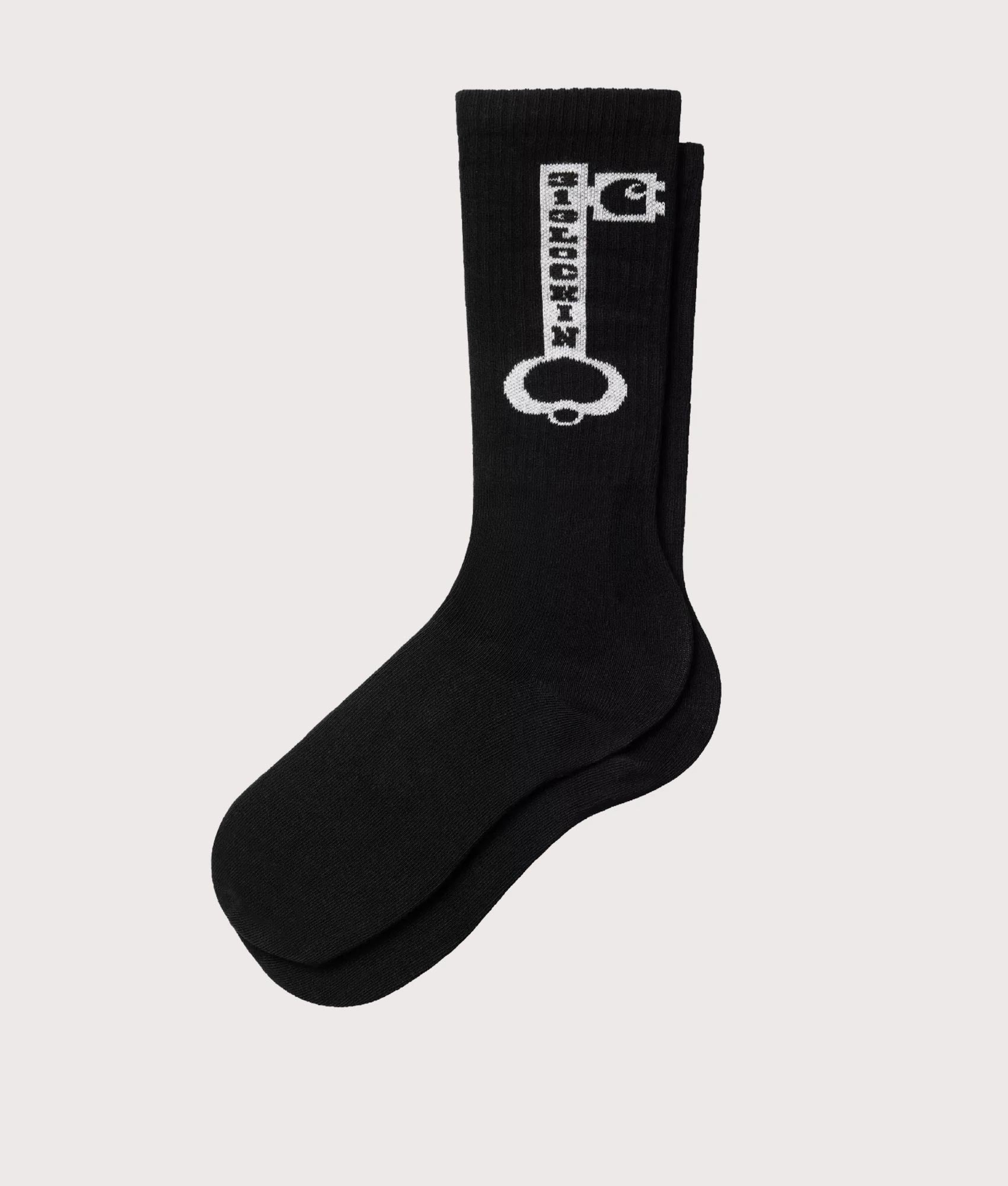 Carhartt WIP Locked Socks in Black and White at EQVVS Menswear. Side shot.