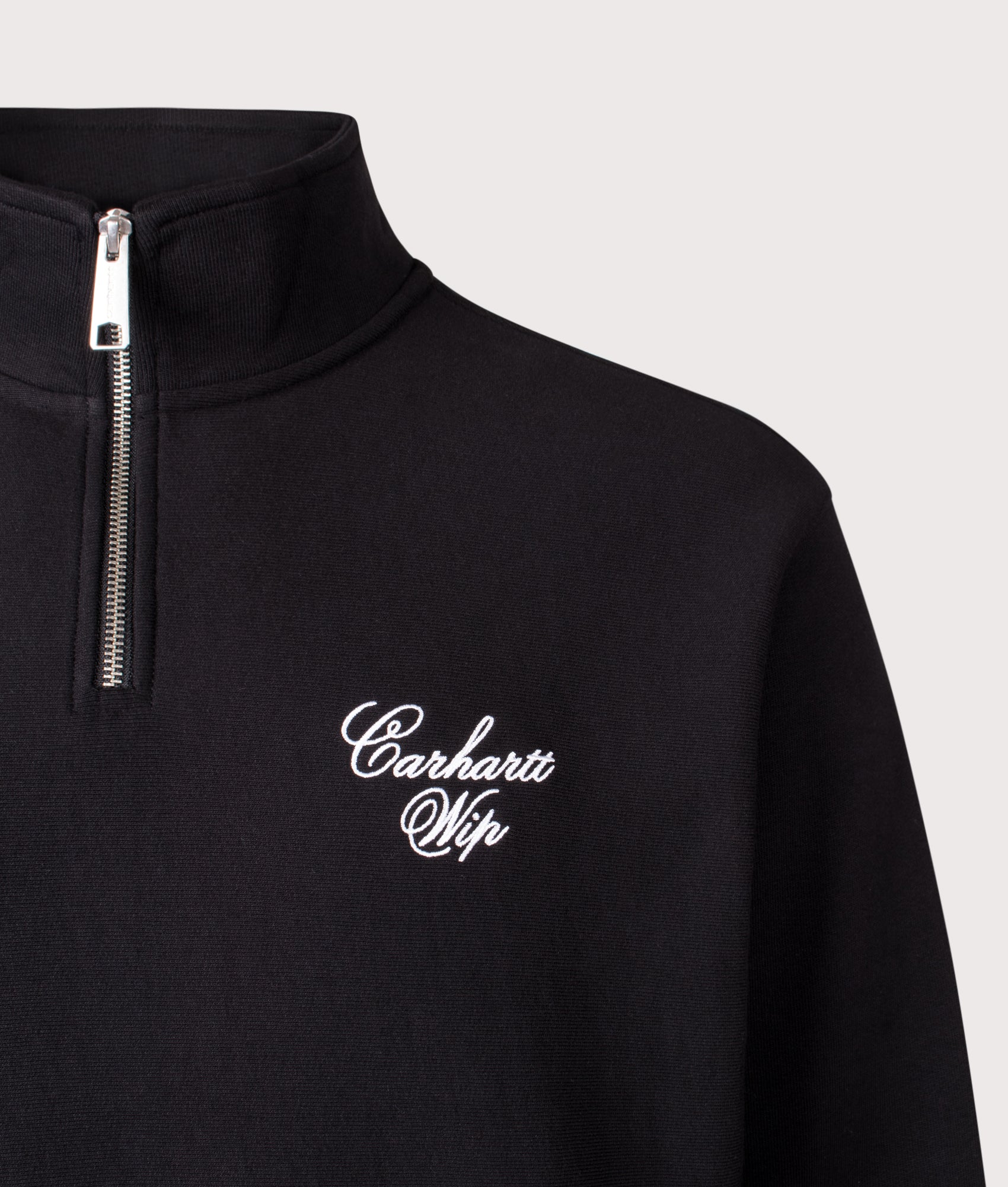 Carhartt WIP Relaxed Fit Longhand Half Zip Sweatshirt in Black and White at EQVVS Menswear. Detail shot.