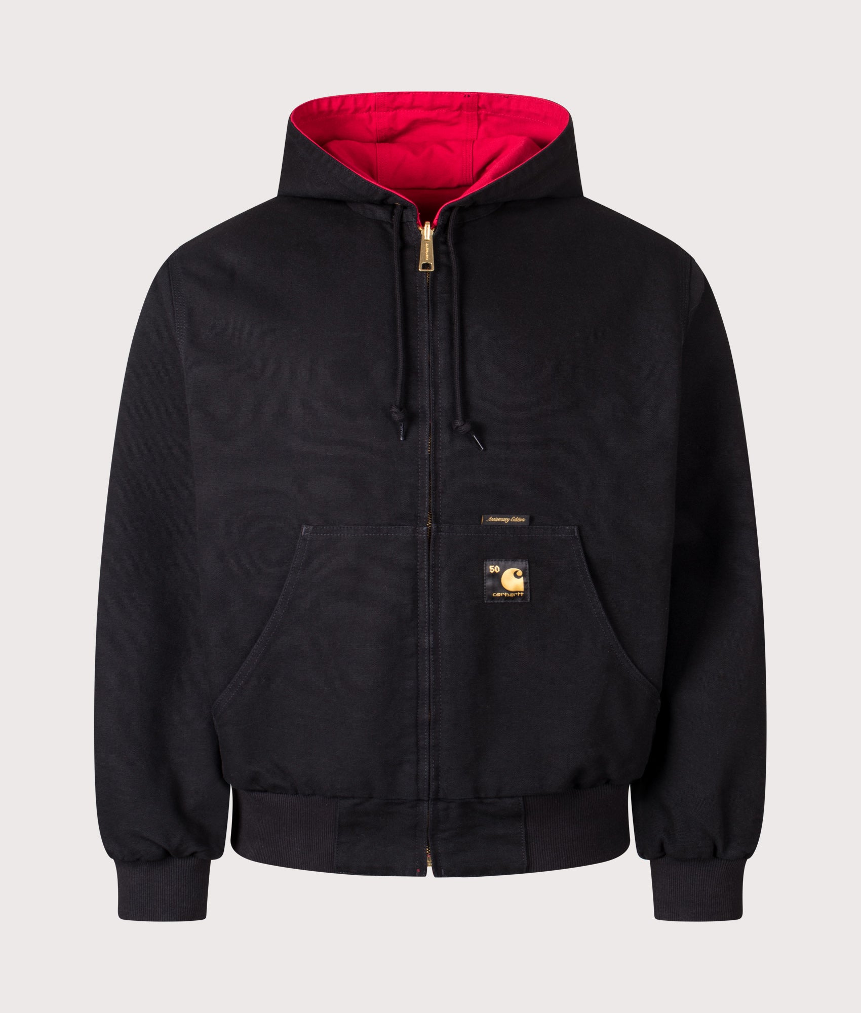 Carhartt WIP 50 Years Anniversary OG Active Canvas Jacket in Black/USA Red at EQVVS Menswear. Side A front shot.