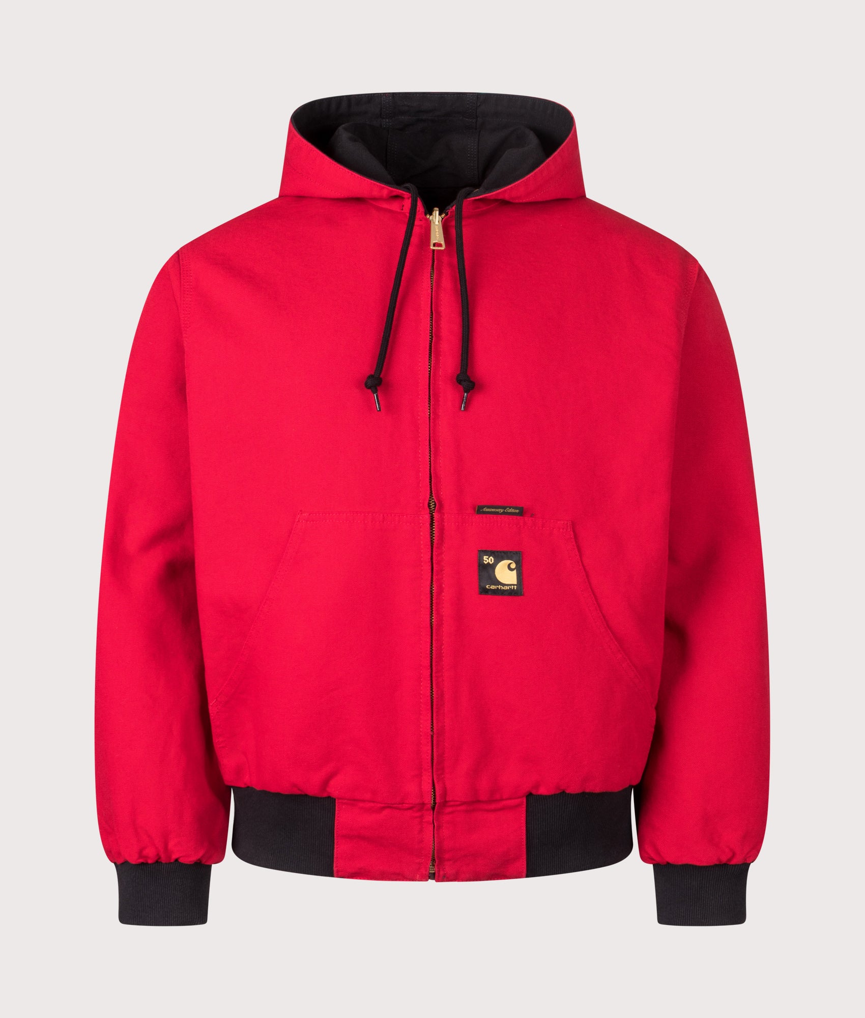 Carhartt WIP 50 Years Anniversary OG Active Canvas Jacket in Black/USA Red at EQVVS Menswear. Side B front shot.