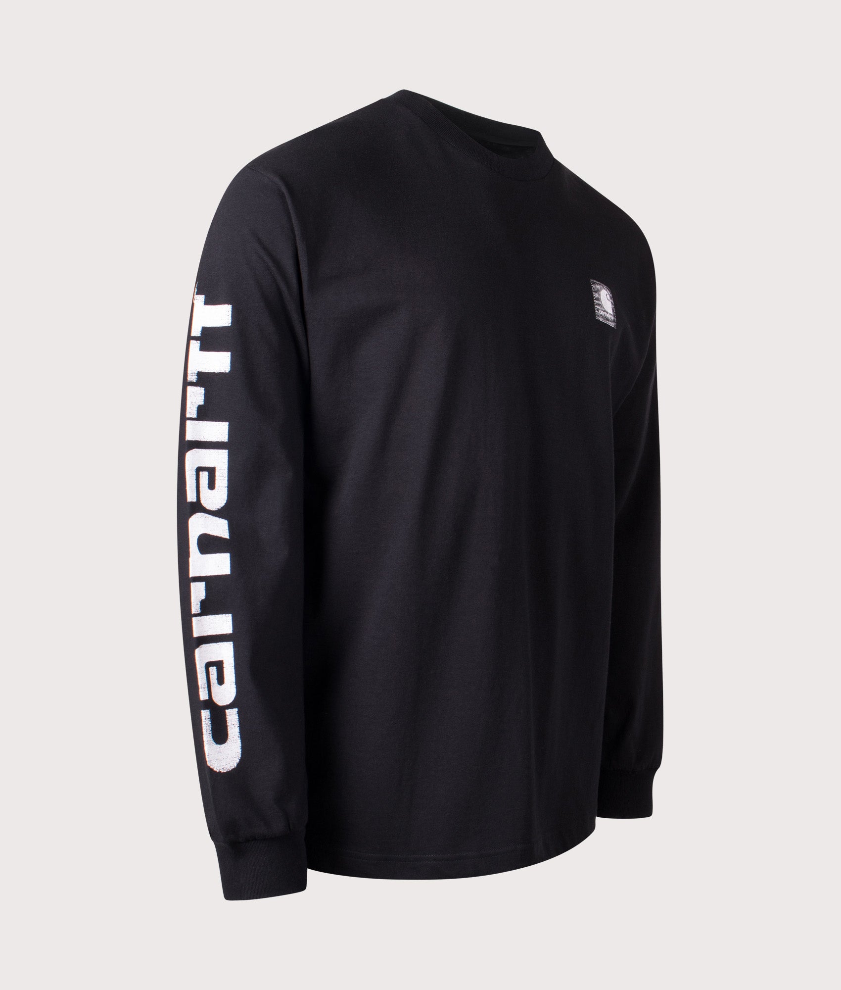 Carhartt WIP Relaxed Fit Archive Script Long Sleeve Top in Black at EQVVS Menswear. Angled front shot.