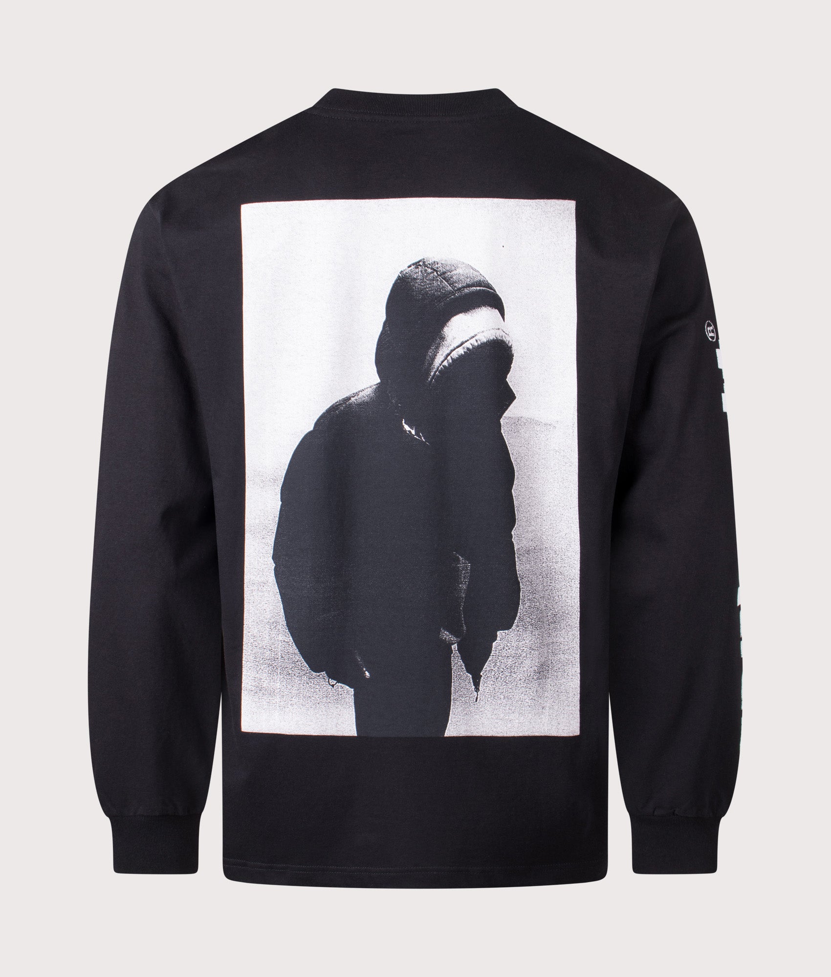 Carhartt WIP Relaxed Fit Archive Script Long Sleeve Top in Black at EQVVS Menswear. Back shot.