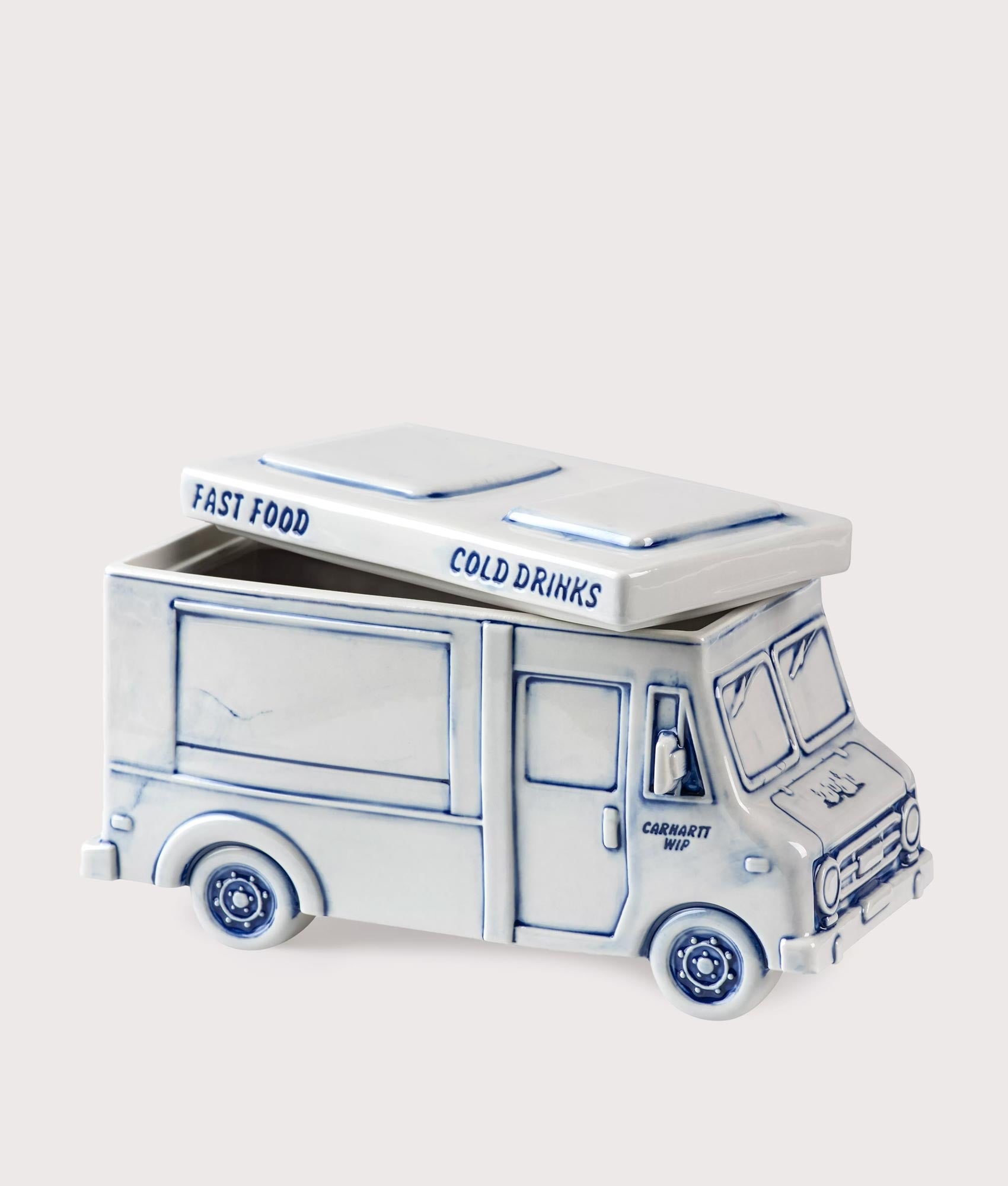Carhartt WIP Cold Drinks Ice Cube Dispenser in Wax and Blue at EQVVS Menswear. Side shot with lid open.