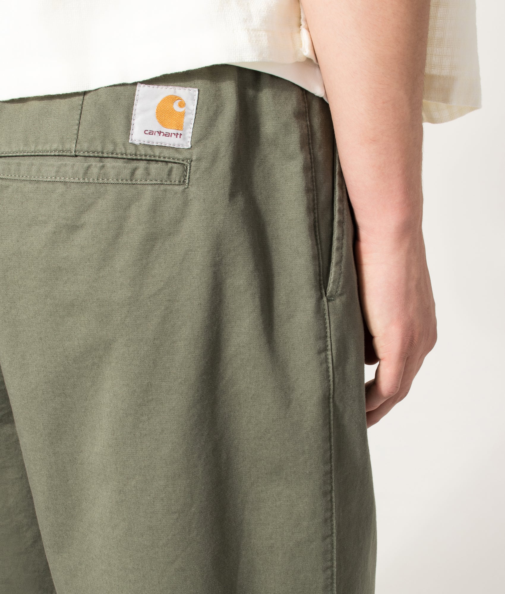 Carhartt WIP Marv Pants in Leaf at EQVVS Menswear. Back detail shot.