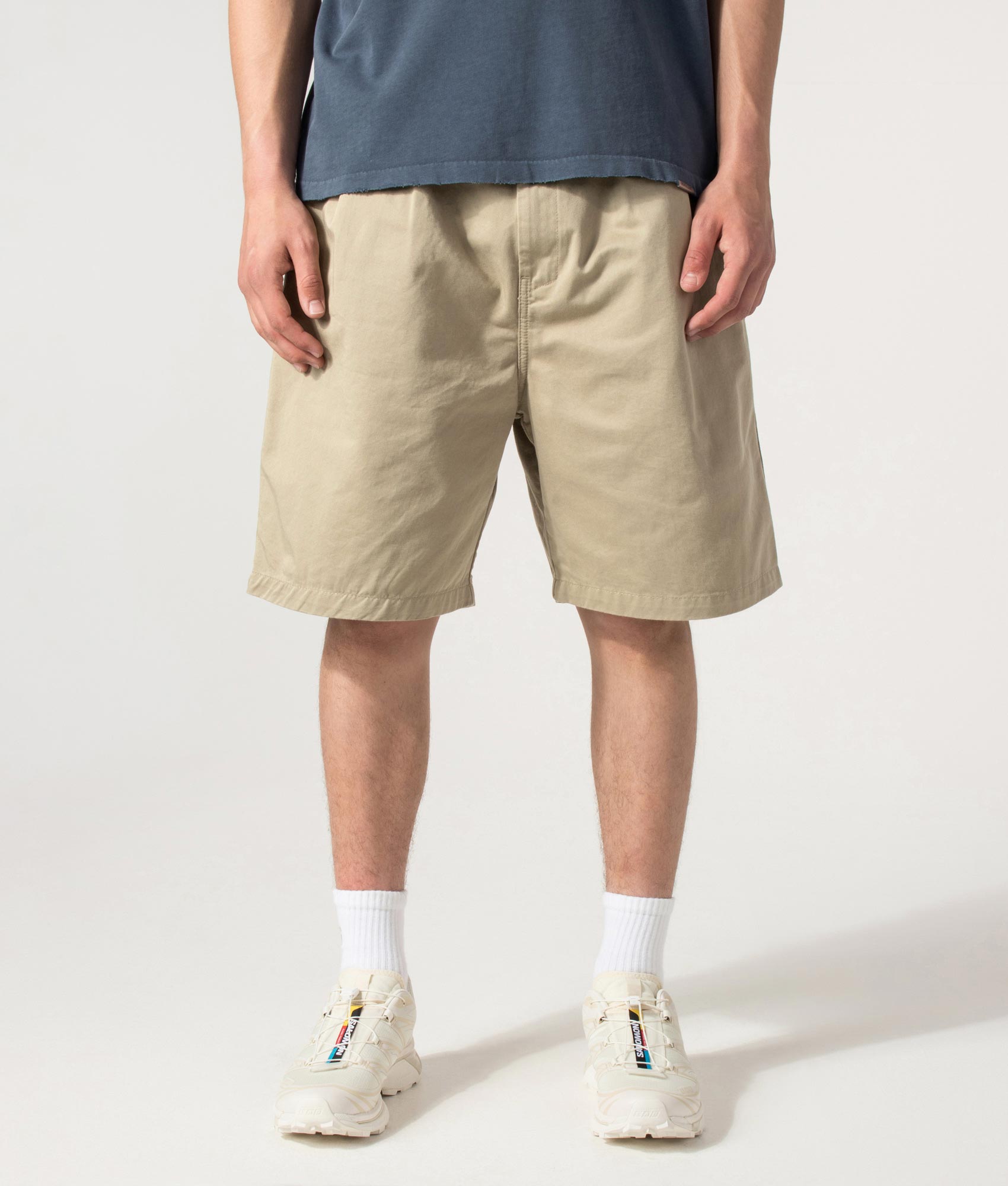 Carhartt WIP Marv Shorts in Stone Washed Iroko at EQVVS Menswear. Model front shot.