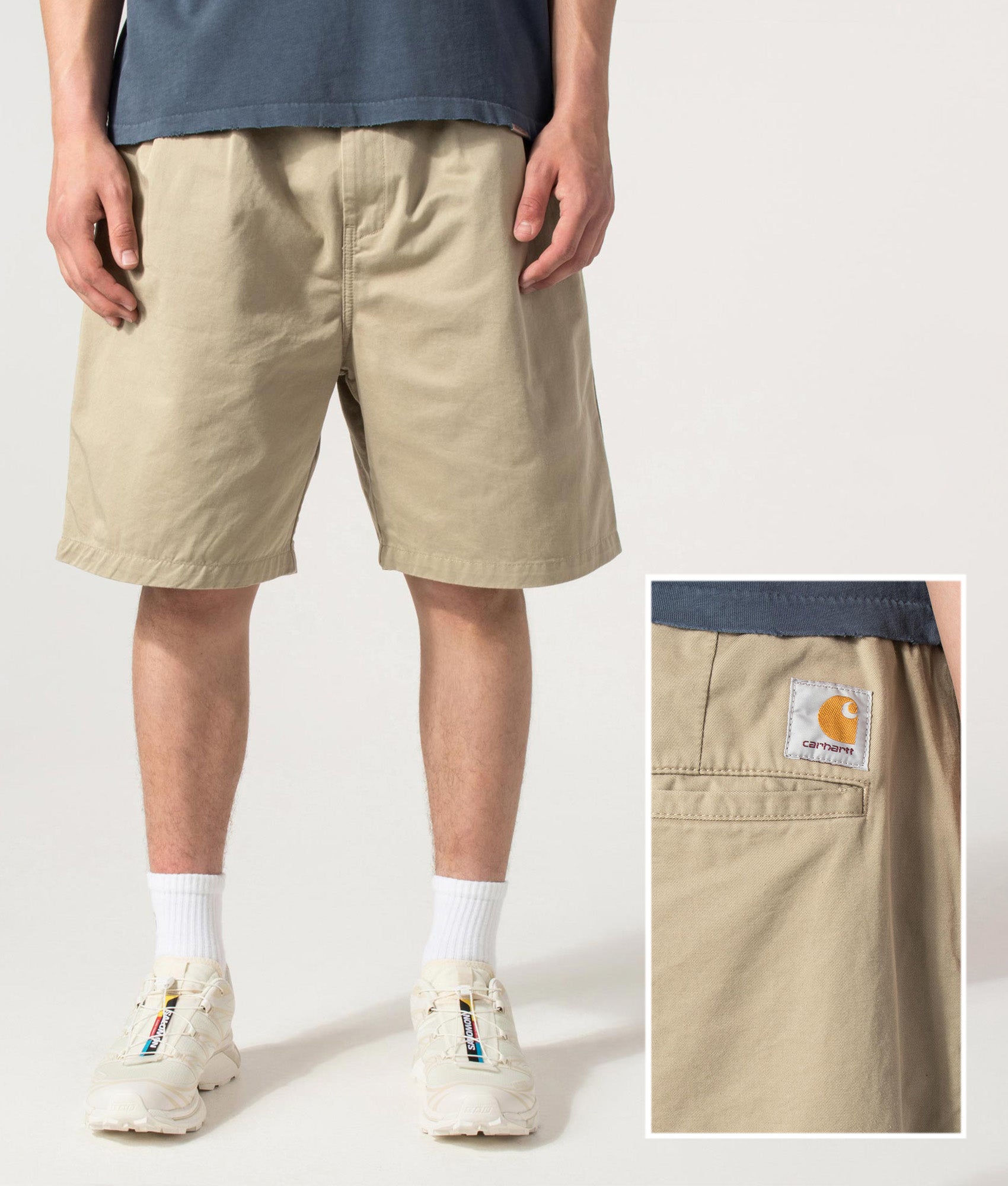 Carhartt WIP Marv Shorts in Stone Washed Iroko at EQVVS Menswear. Front and back detail shot.