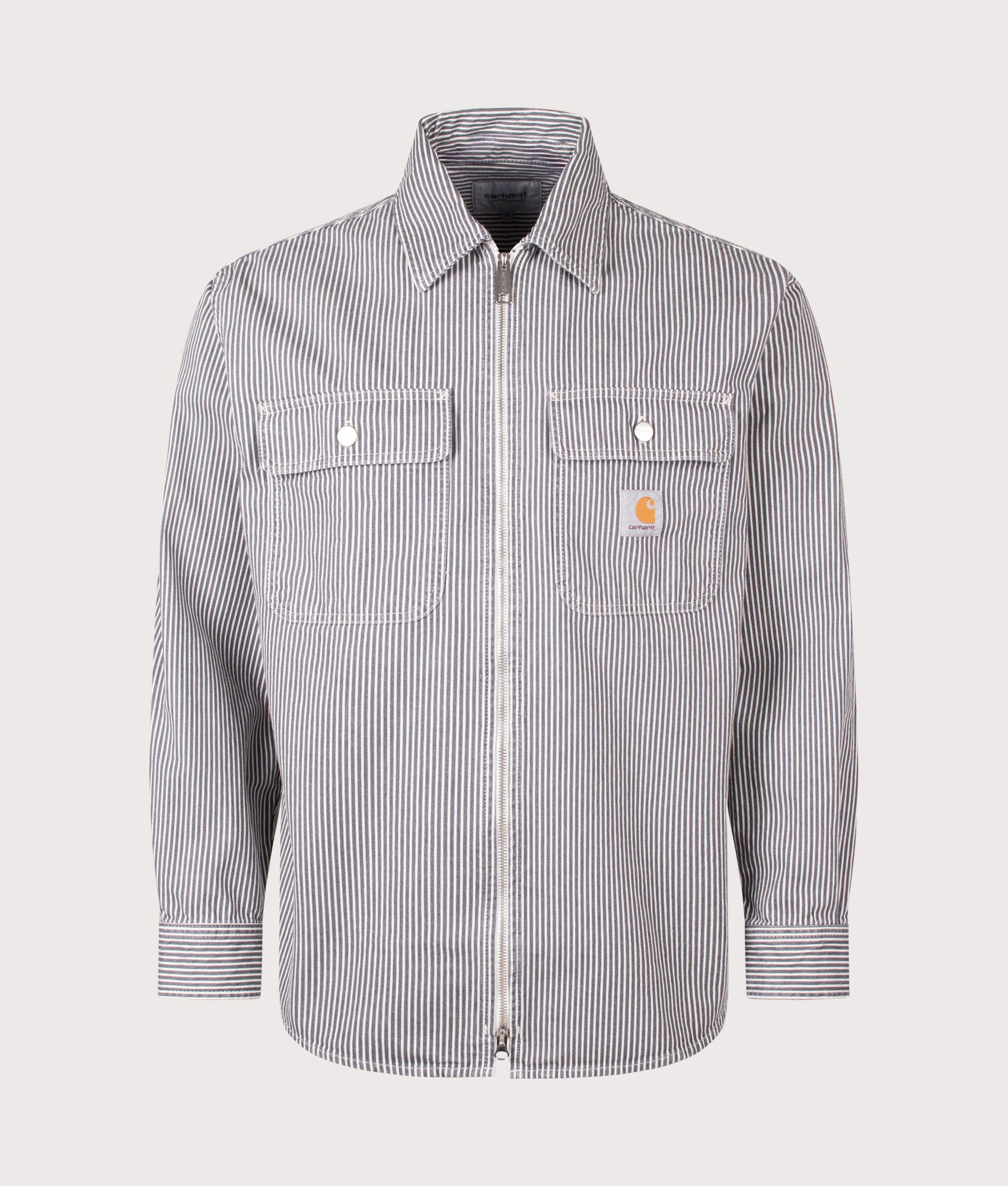 Carhartt WIP Hickory Stripe Mercer Overshirt in Graphite and Wax at EQVVS  Menswear. Front shot.