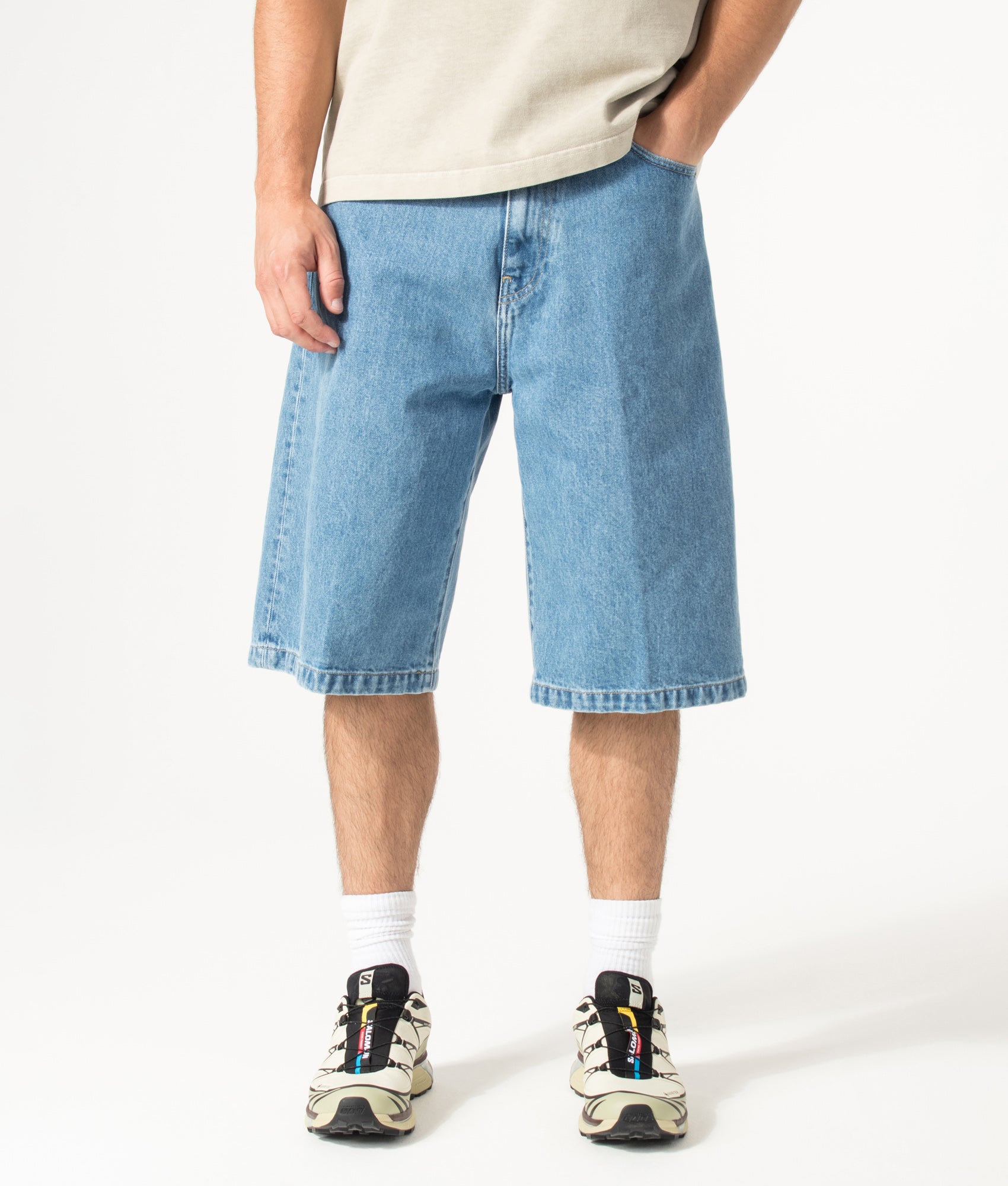 Carhartt WIP Loose Fit Langdon Denim Shorts in Blue at EQVVS Menswear. Model front shot.