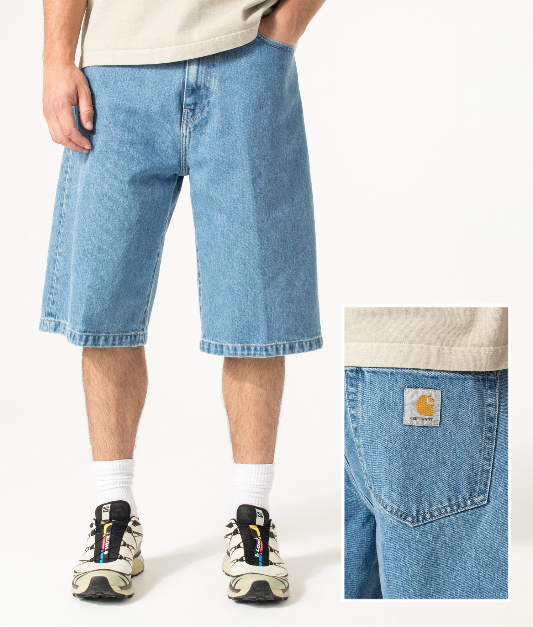 Carhartt WIP Loose Fit Langdon Denim Shorts in Blue at EQVVS Menswear. Model front and detail shot.