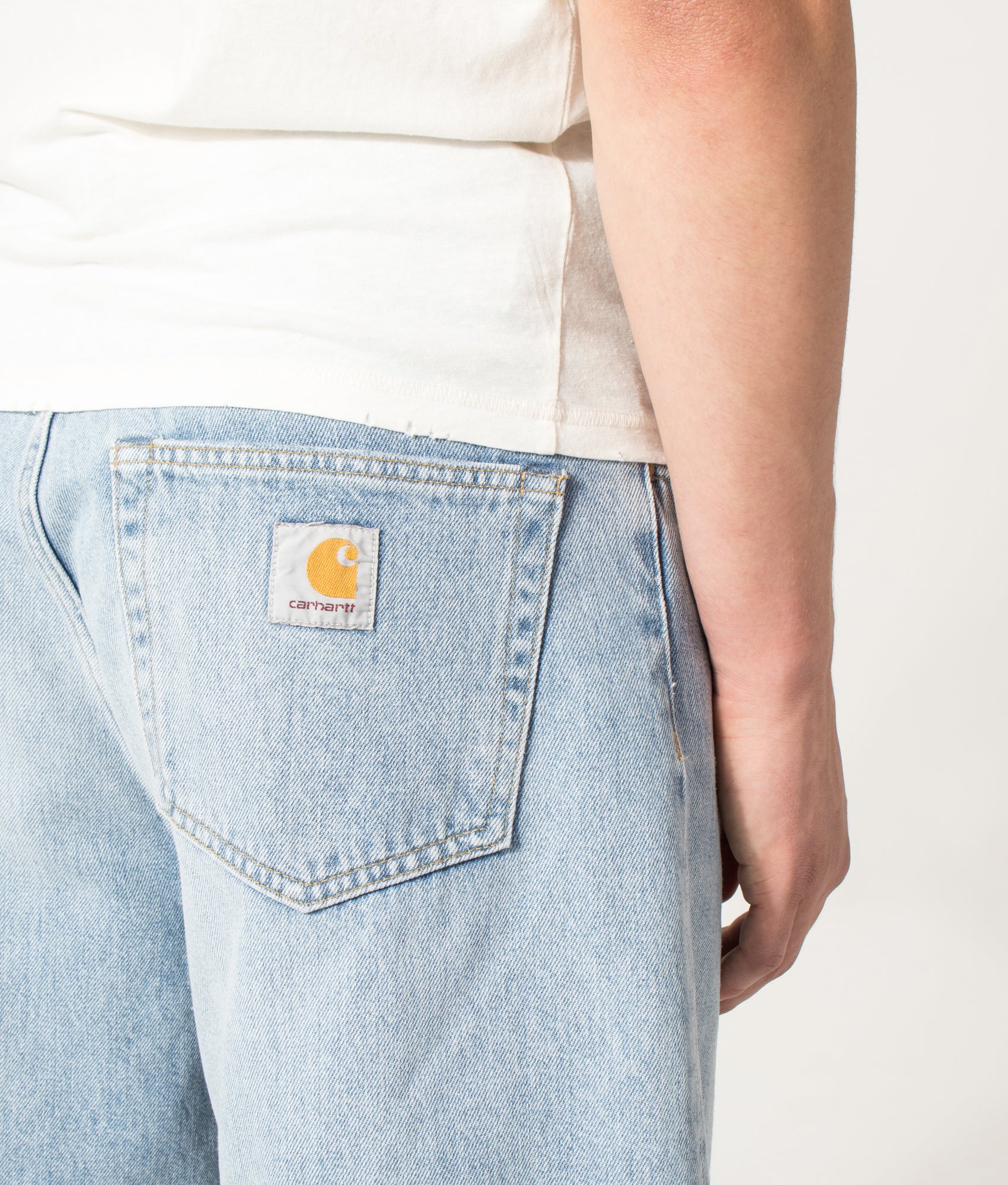 Carhartt WIP Loose Fit Langdon Denim Shorts in Heavy Worn Bleached Blue at EQVVS Menswear. Back detail shot.