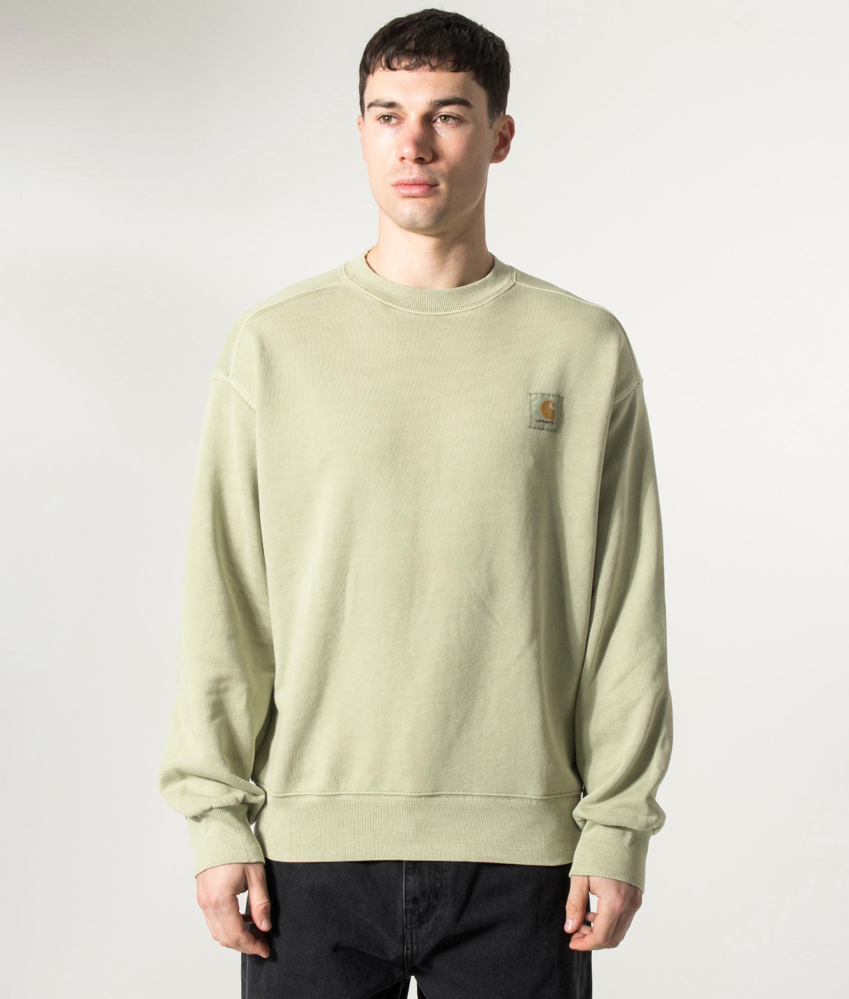 Carhartt WIP Oversized Nelson Sweatshirt in Gentle Green at EQVVS Menswear. Model front shot.