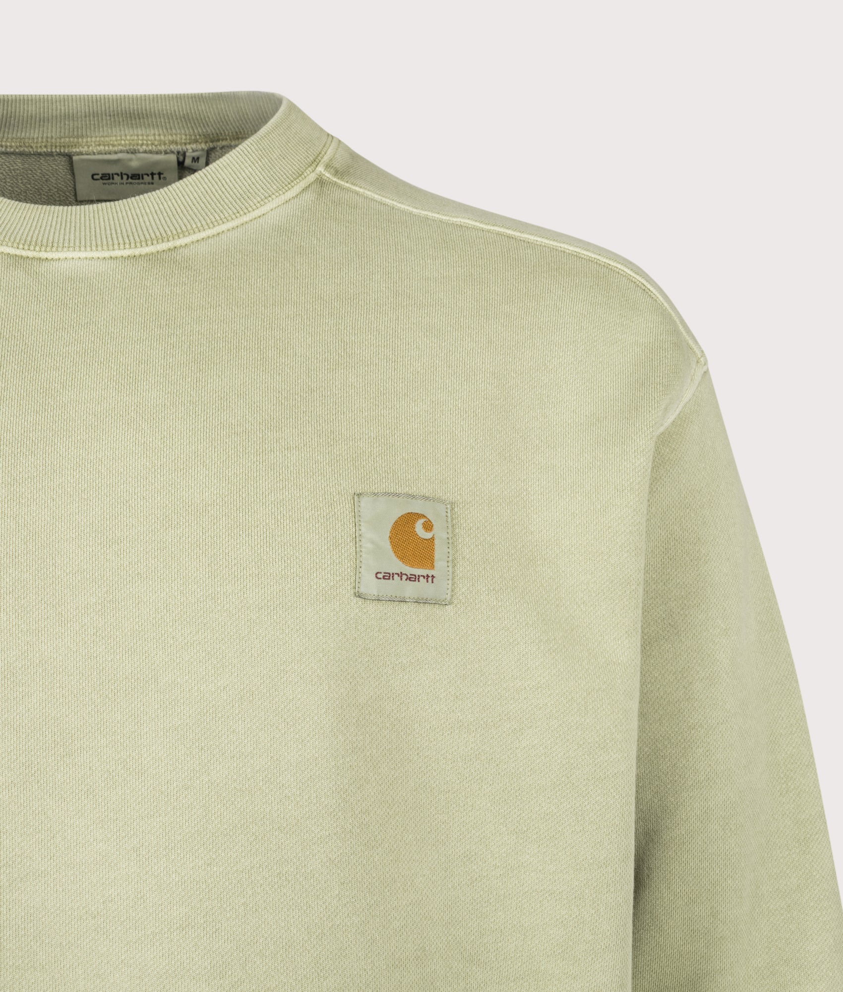 Carhartt WIP Oversized Nelson Sweatshirt in Gentle Green at EQVVS Menswear. Detail shot.