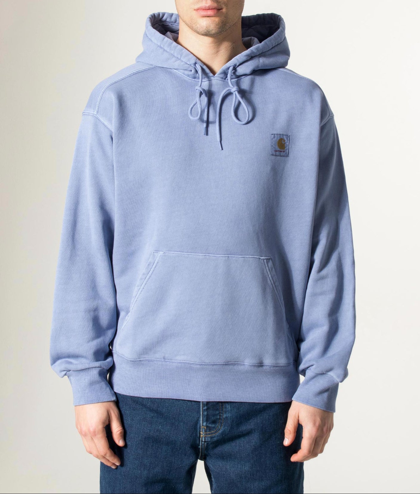Carhartt WIP Oversized Nelson Sweatshirt in Gentle Blue at EQVVS Menswear. Model front shot.