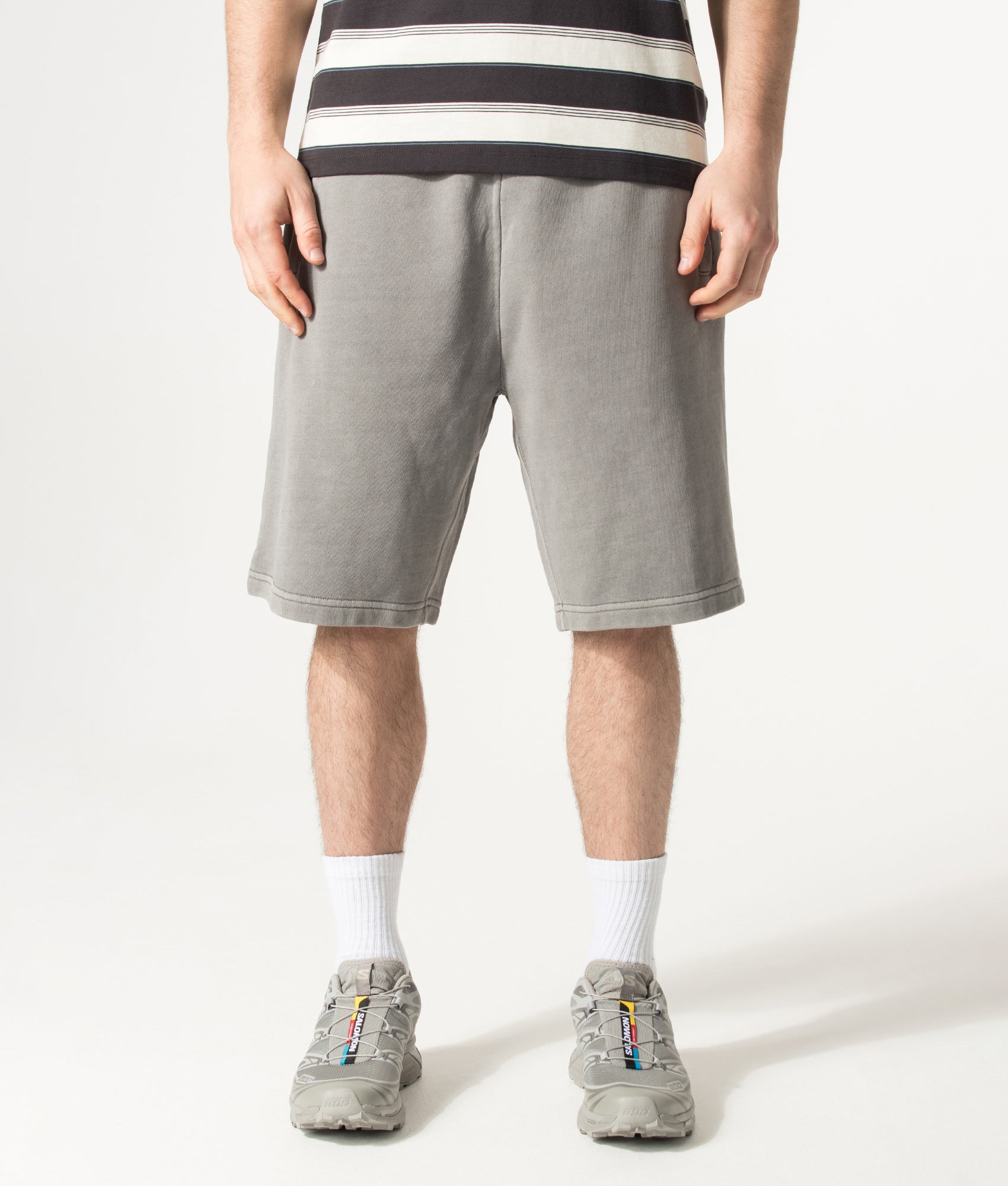 Carhartt WIP Balloon Fit Nelson Sweat Shorts in Yosemite at EQVVS Menswear. Model front shot.