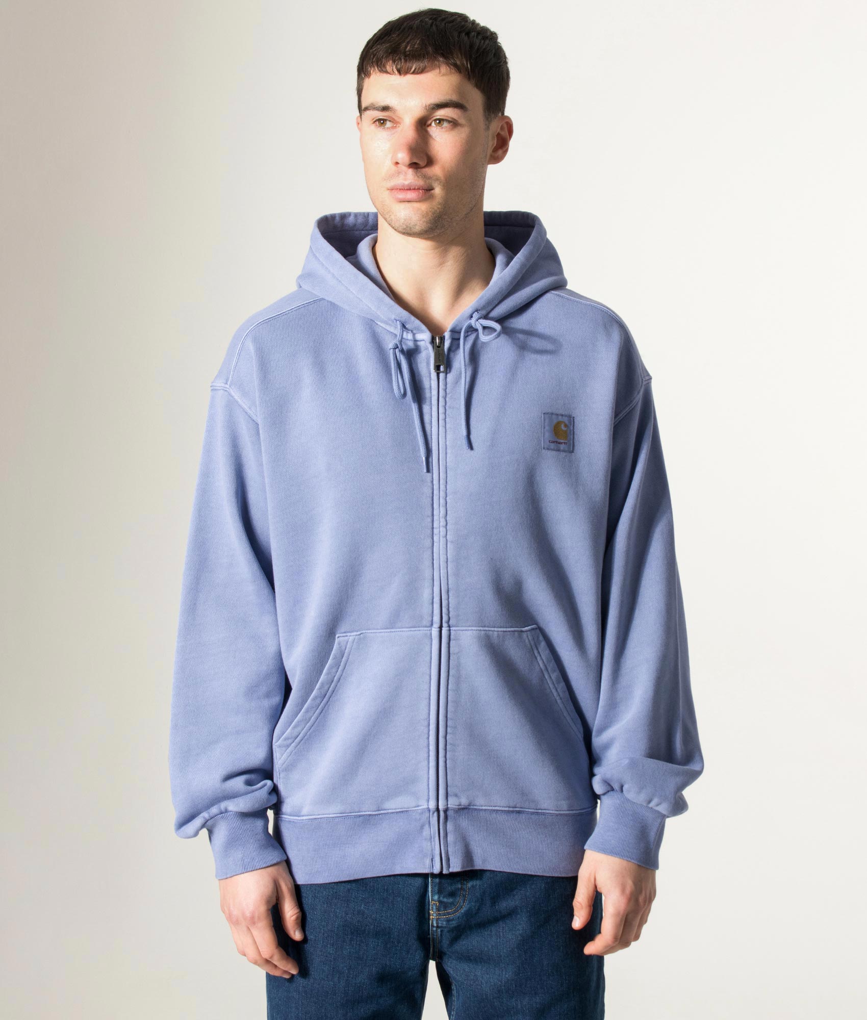 Carhartt WIP Oversized Nelson Sweatshirt in Gentle Blue at EQVVS Menswear. Model front shot.