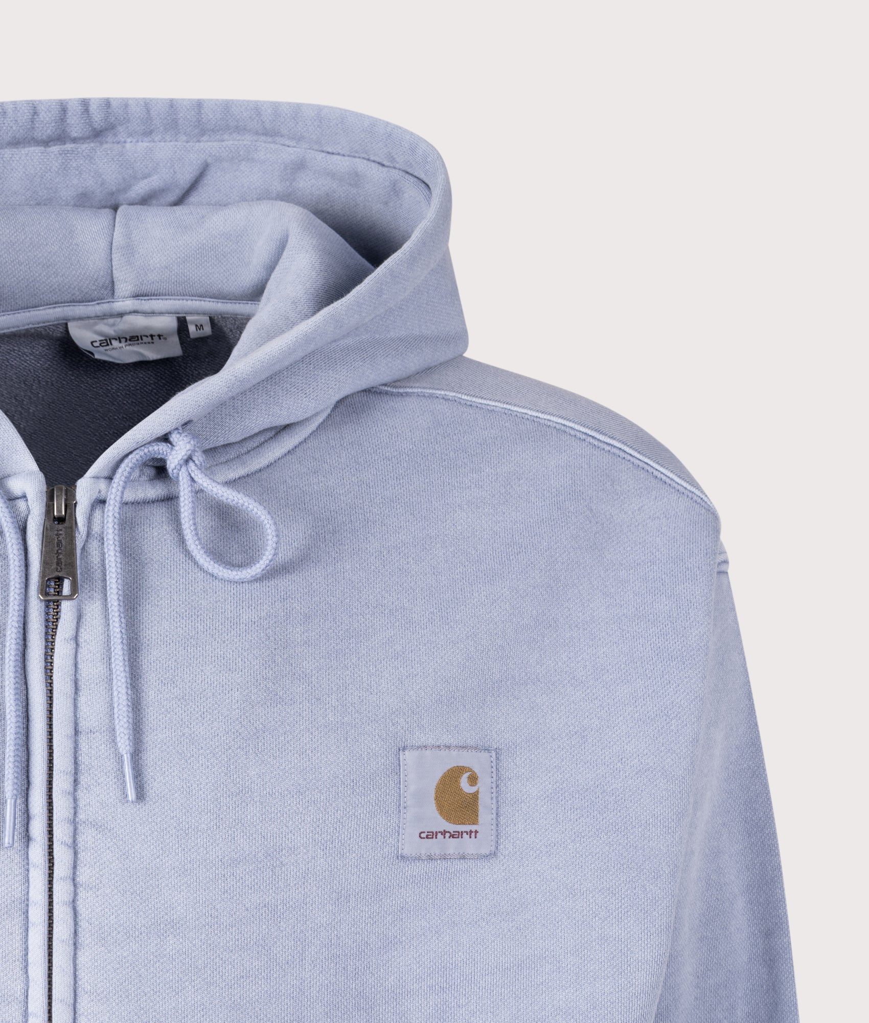 Carhartt WIP Oversized Nelson Sweatshirt in Gentle Blue at EQVVS Menswear. Detail shot.