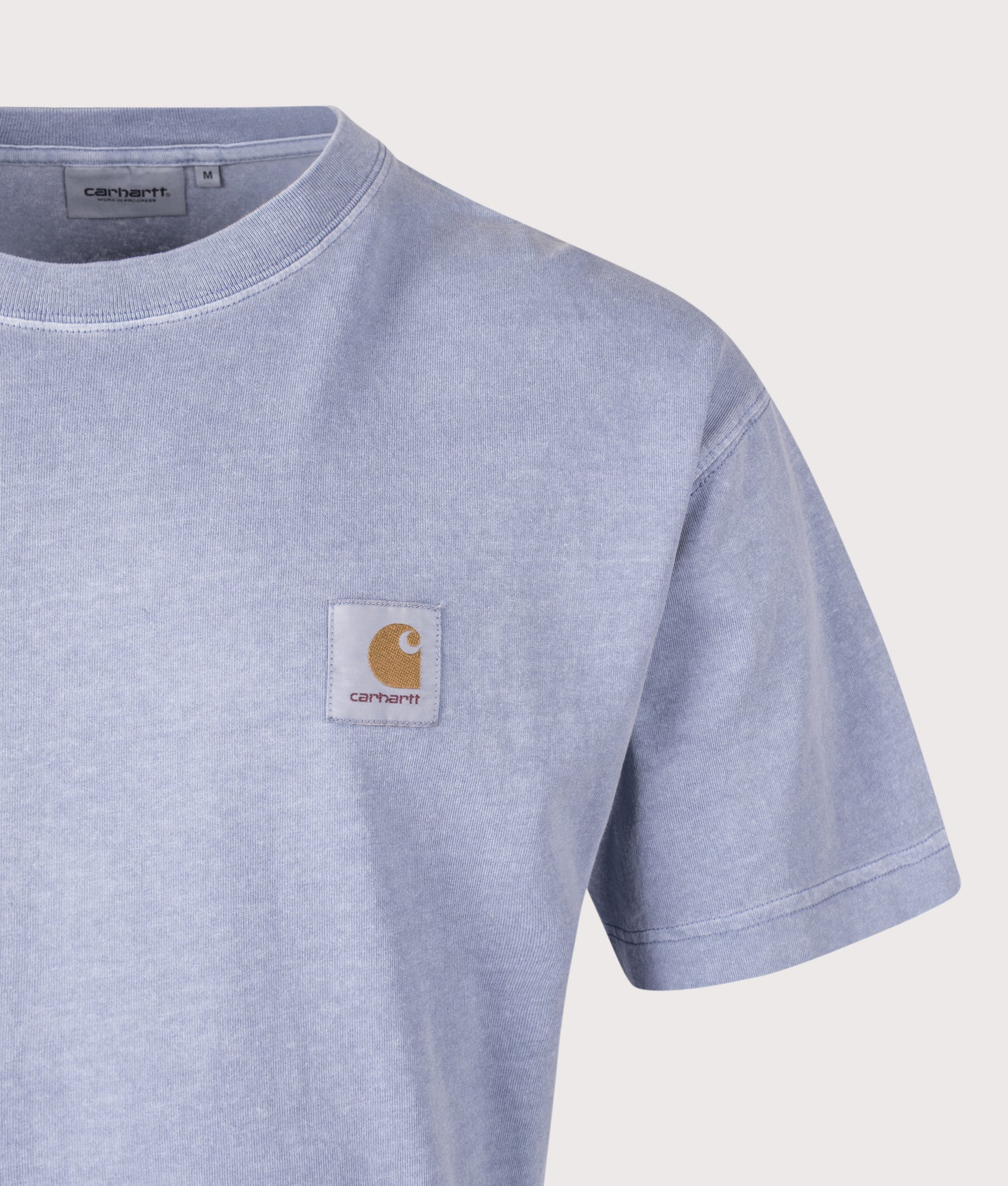 Carhartt WIP Relaxed Fit Nelson T-Shirt in Gentle Blue at EQVVS Menswear. Detail shot.