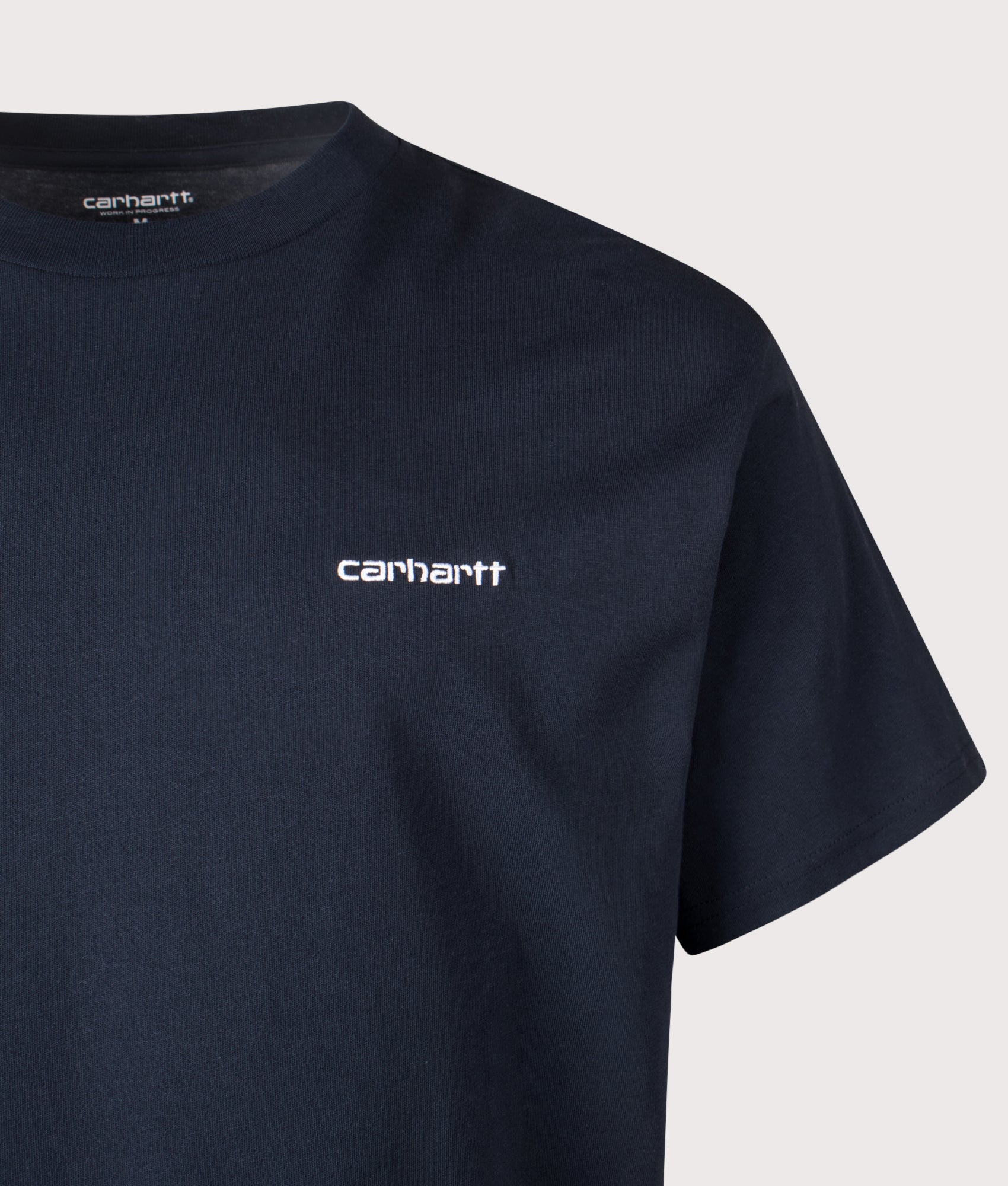 Carhartt WIP Loose Fit Script Embroidery T-Shirt in Deep Night and White at EQVVS Menswear.  Detail shot.