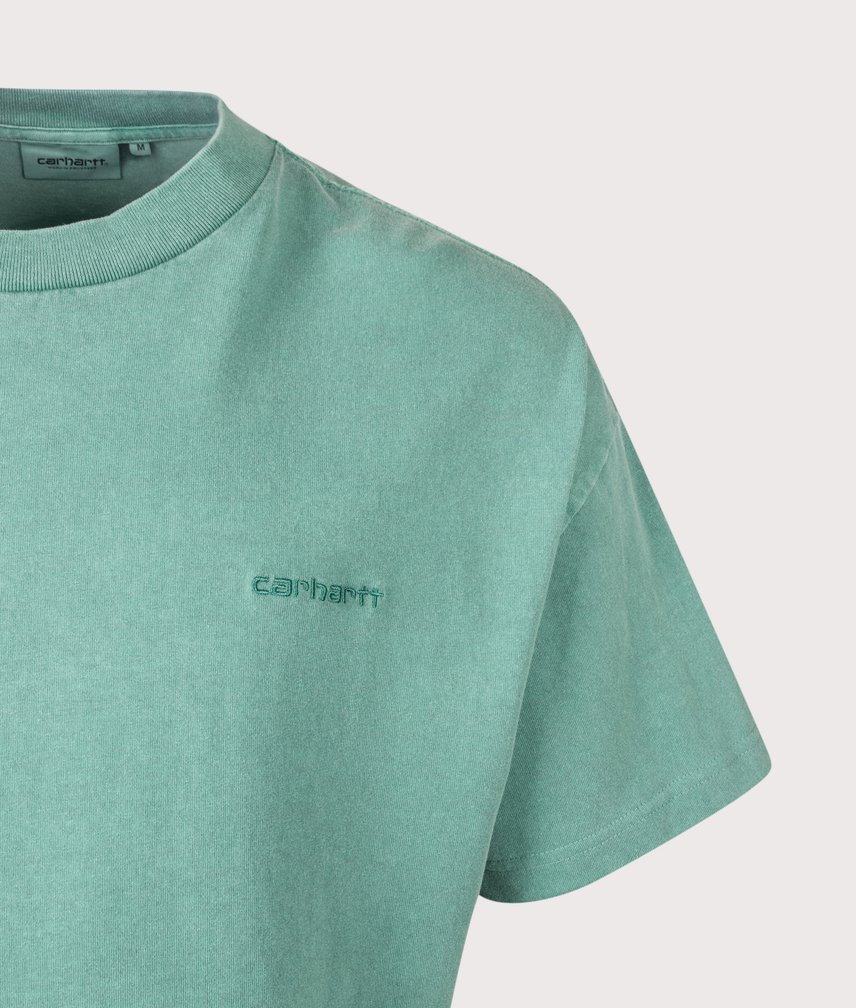 Carhartt WIP Boxy Loose Fit Benton T-Shirt in Lily at EQVVS Menswear. Detail shot.