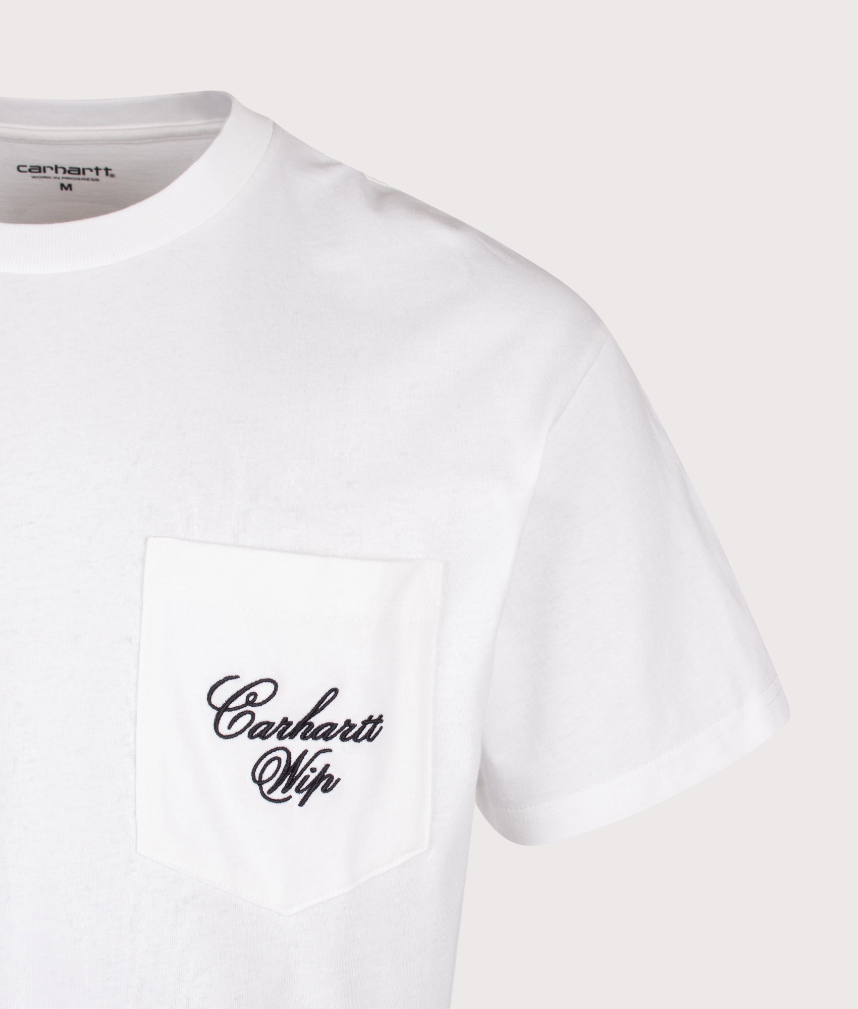 Carhartt WIP Loose Fit Longhand Pocket T-Shirt in White and Black at EQVVS Menswear. Detail shot.