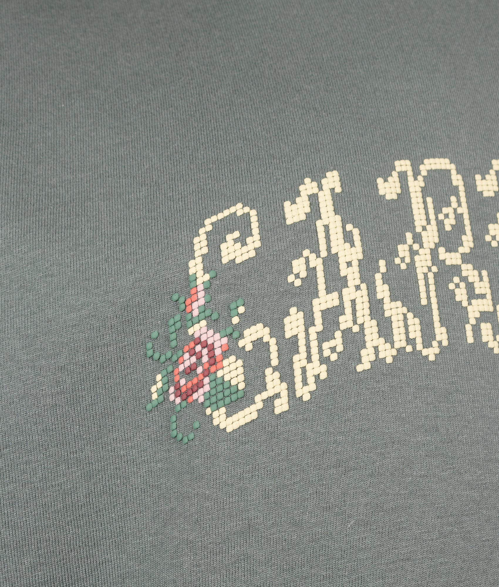 Loose Fit Monogram T-Shirt in Velvet Green by Carhartt WIP. Shot by EQVVS. Detail shot.